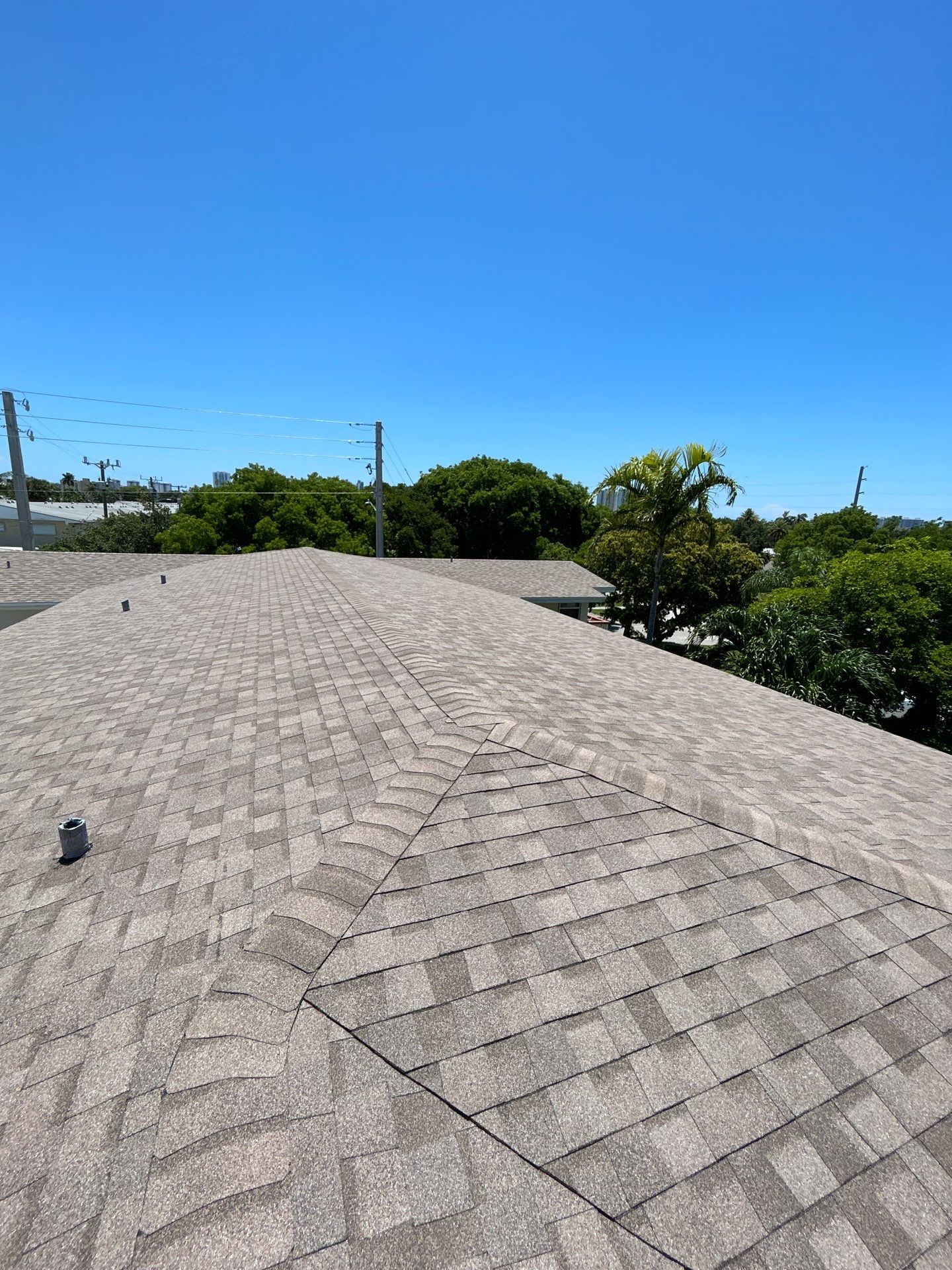 Commercial Roofing Installation using CERTAINTEED LANDMARK AR (SUNRISE CEDAR) by Earl W. Johnston Roofing 