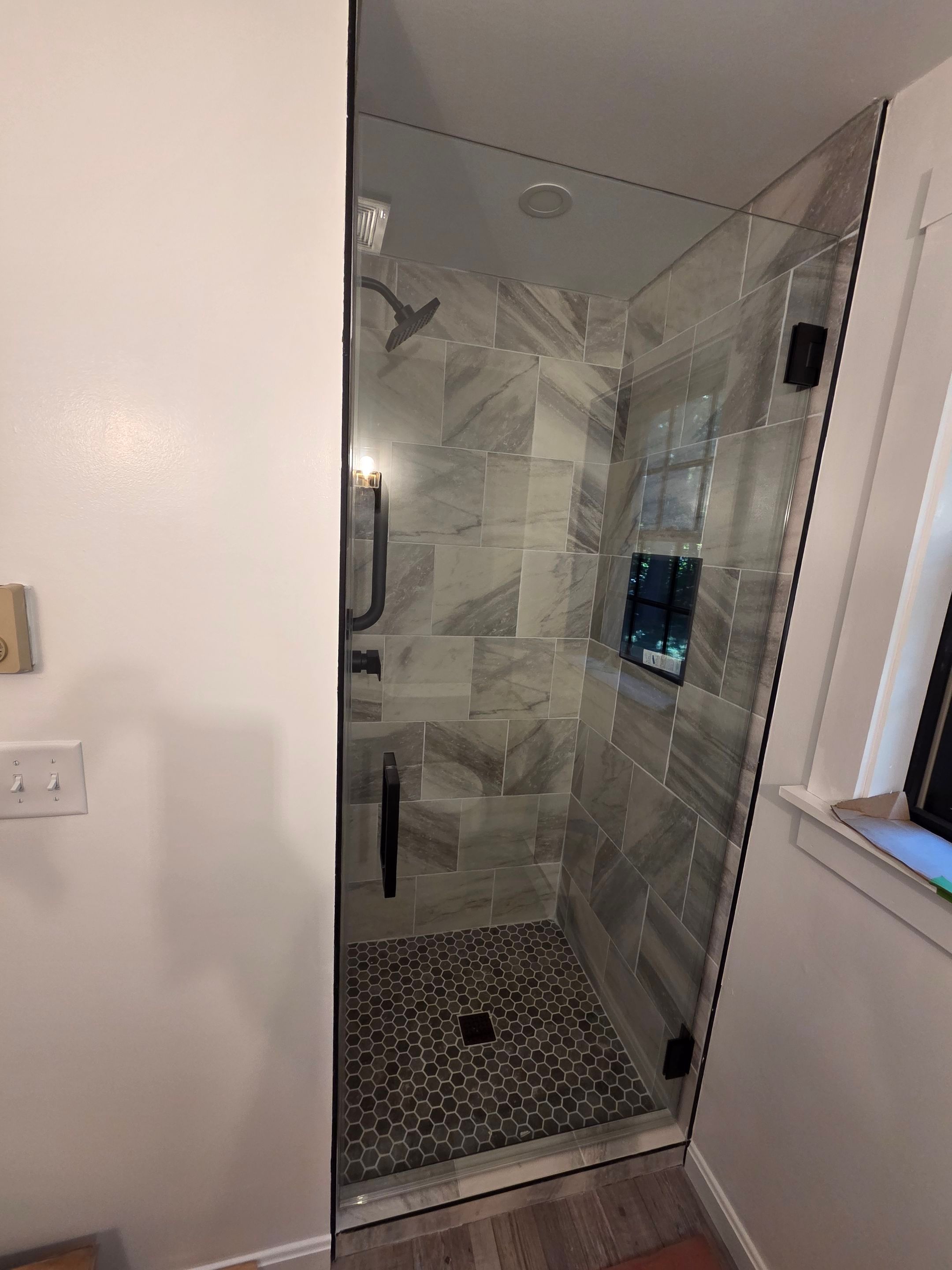 Two Showers using Tempered Shower Glass by Cheshire Glass Company