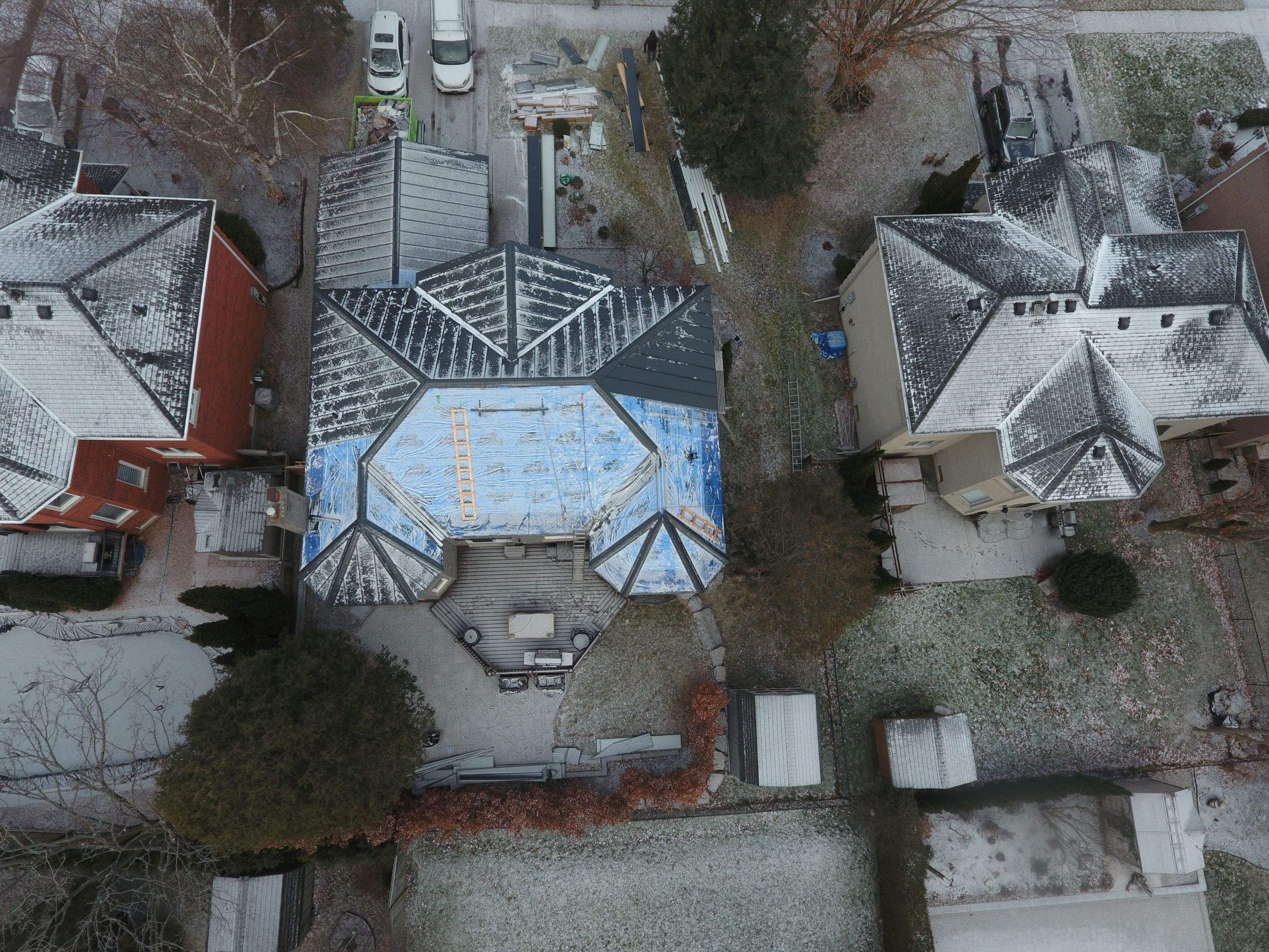 Roof Replacement using 16" Standing Seam Panels by Jay Carter Roofing & Sheet Metal