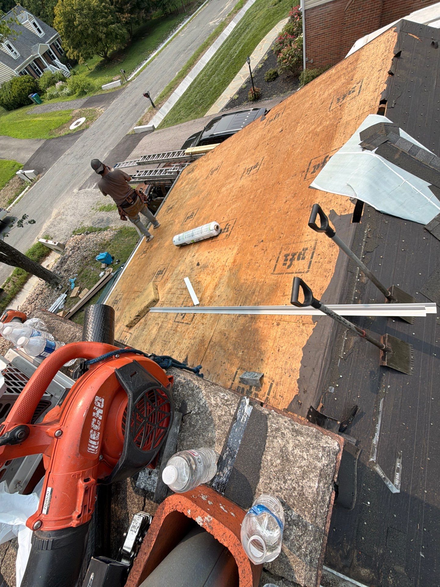 Asphalt Shingle Roof Replacement and Gutter Installation in Richmond by Cade Construction