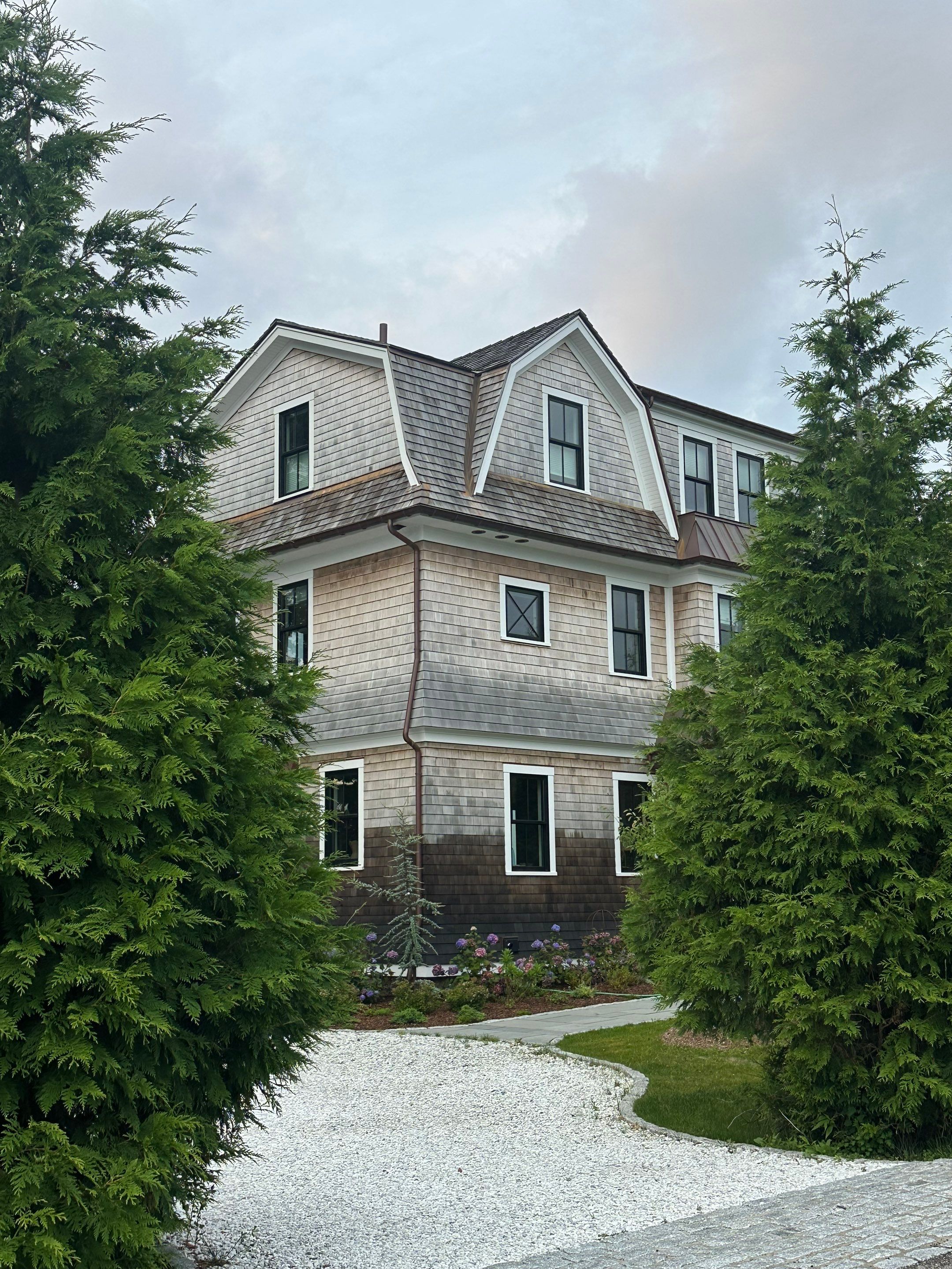 Great Island - Red Cedar Roofing, Yellow Cedar Siding, Standing Seam Copper, & Copper Gutters by Rinaldi Brothers