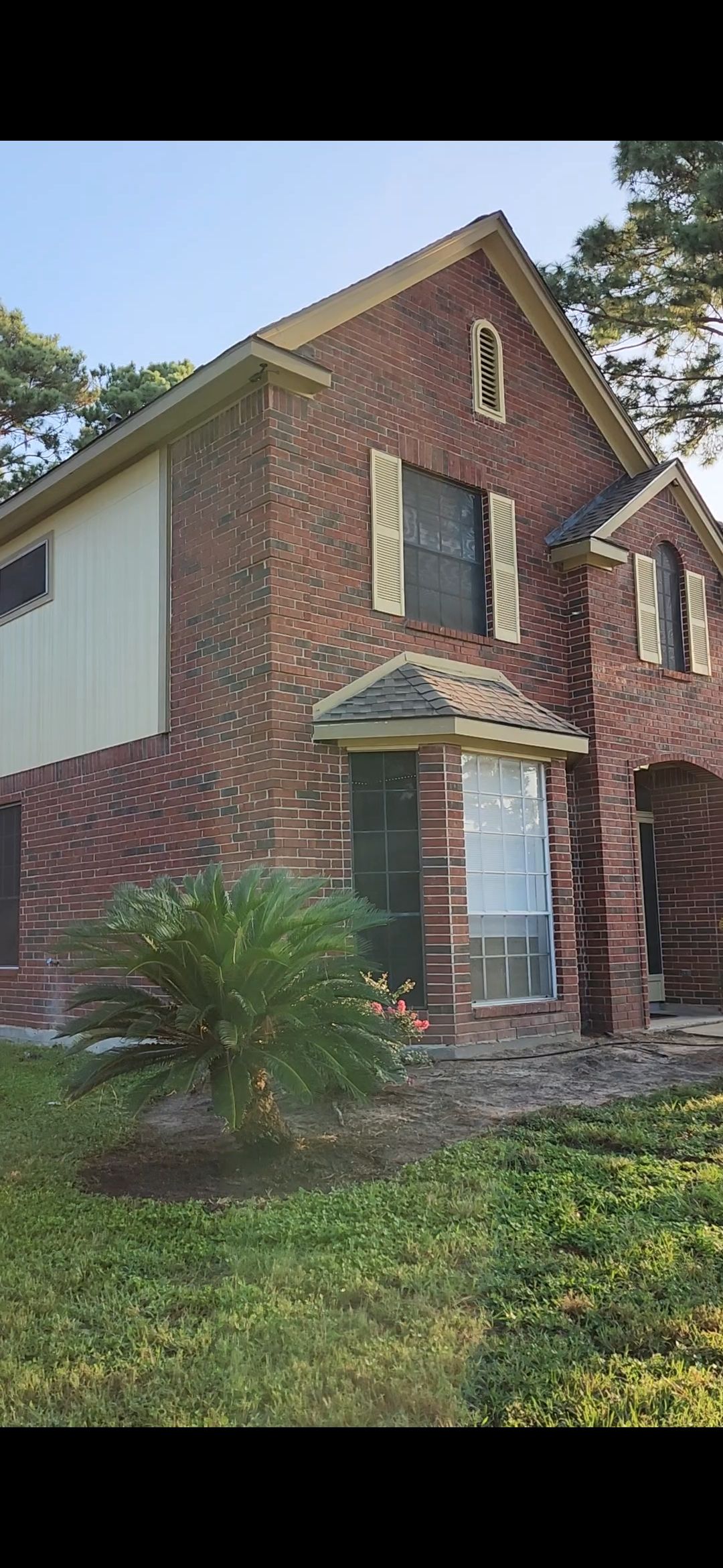 Brick Home Transformation by Fresh Coat Painters of Cypress