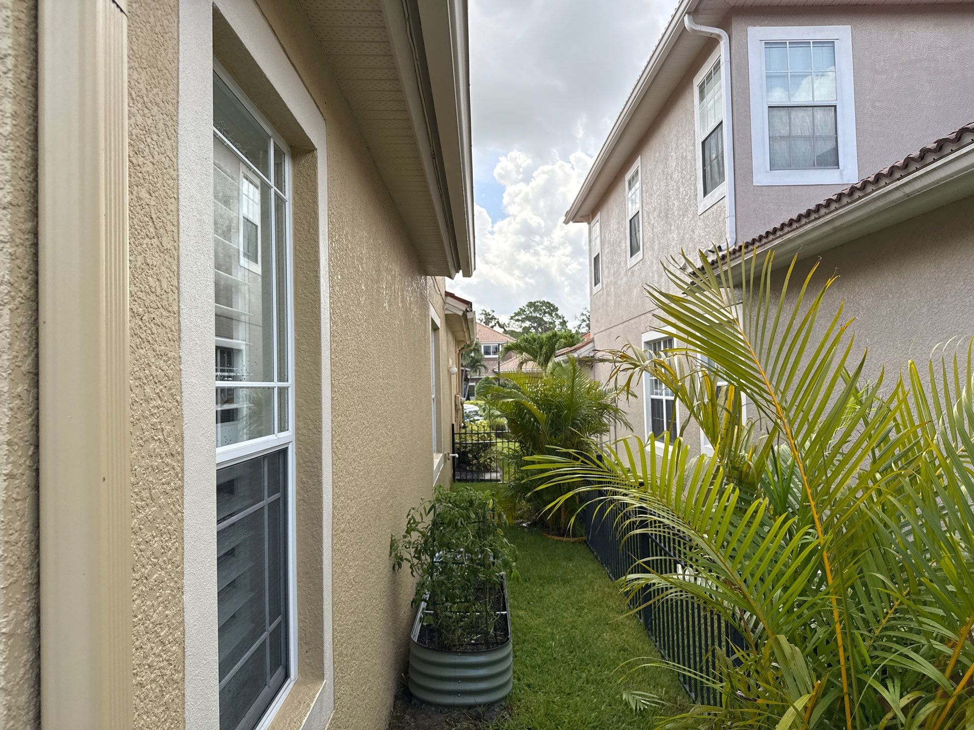 Soft Wash Tile Roof Cleaning in Sonoma Community, Sarasota, FL by Sunshine AquaWash