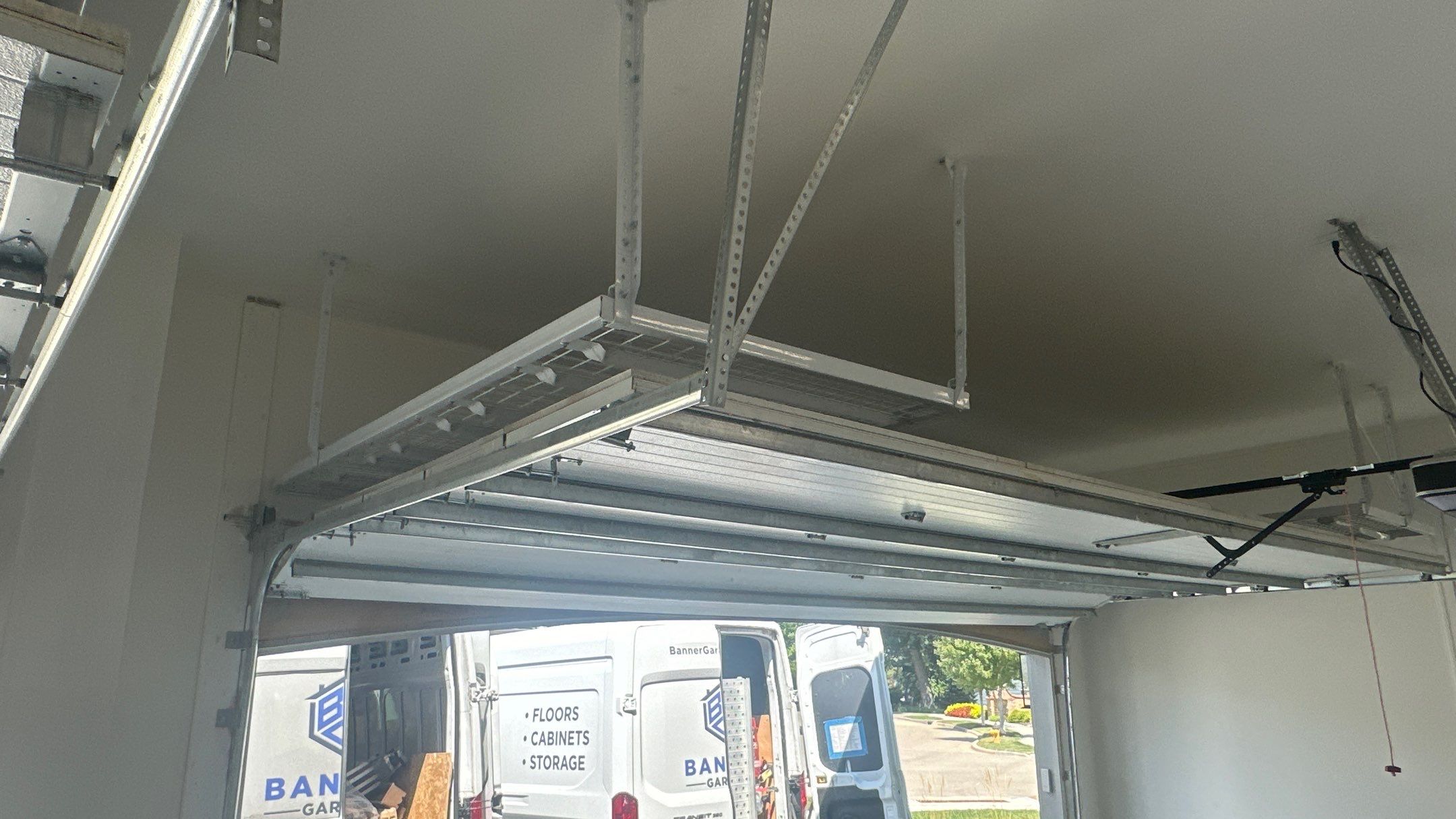 New bike storage for Jason E. along with some overhead racks  by Banner Garage