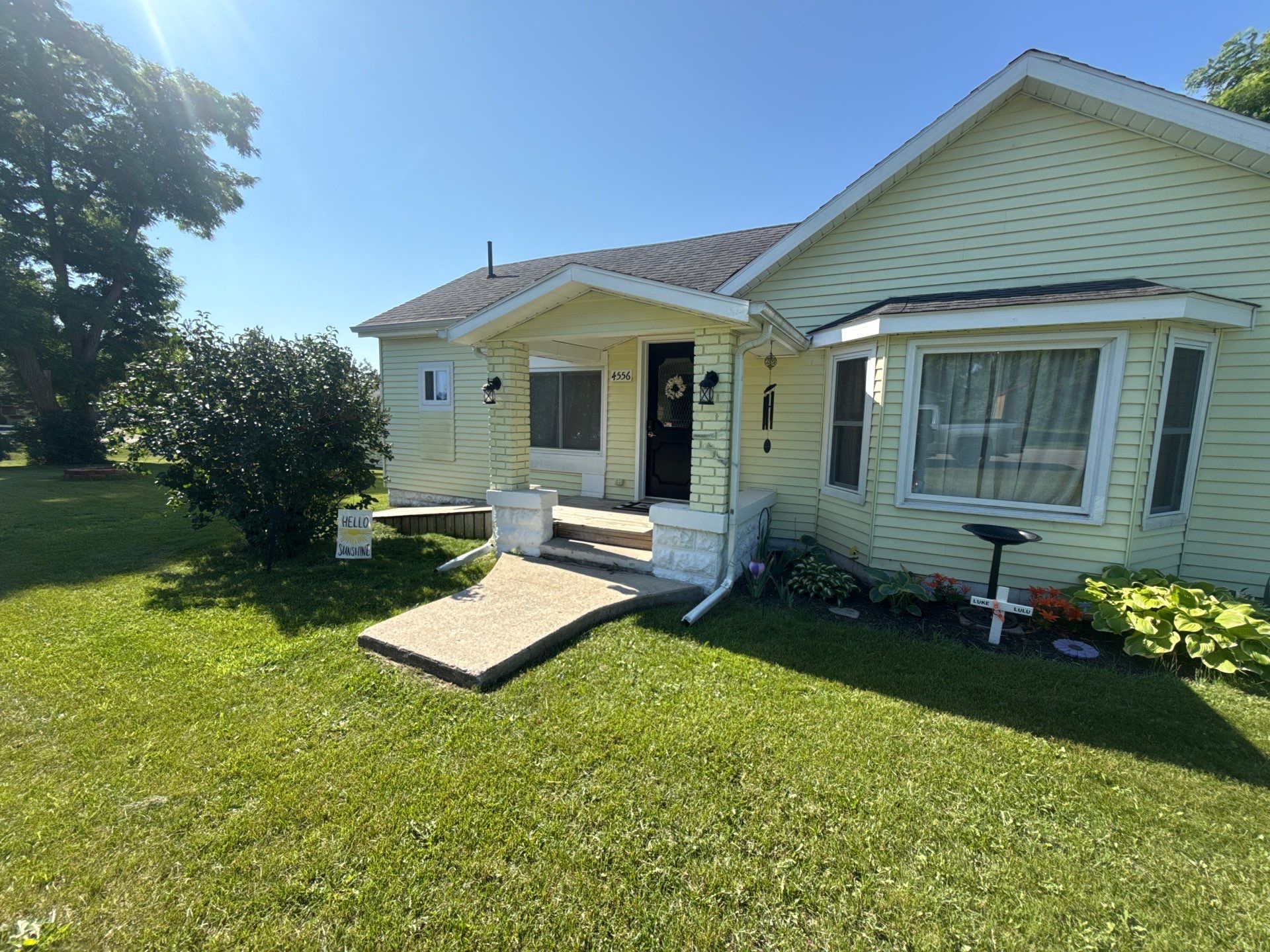 White Gutter and Downspout Installation for Lewiston Residence by Rainbow Seamless Systems