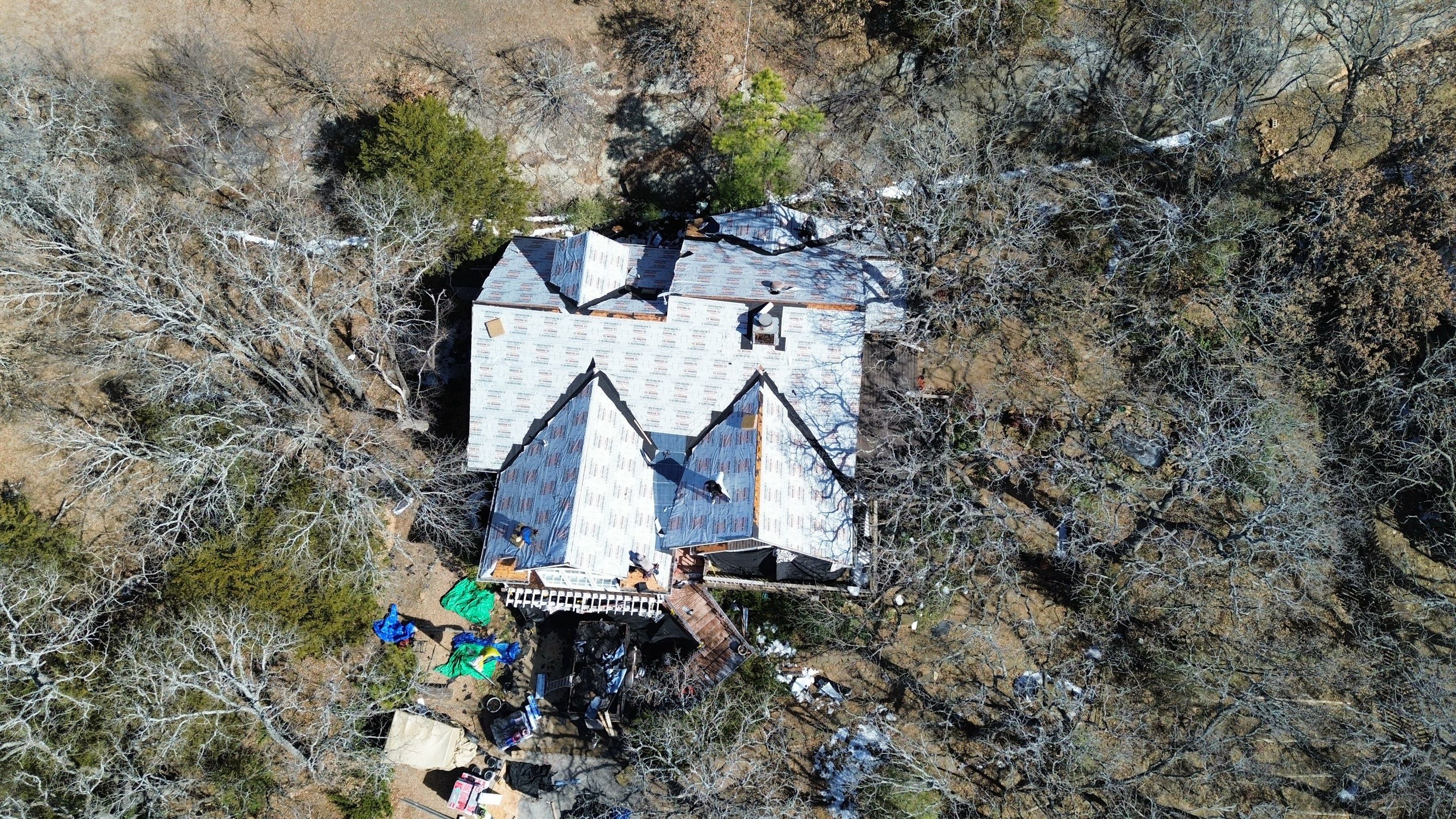 Roof Replacement on a private lake near Ardmore by BANA Roofing and Solar Supply