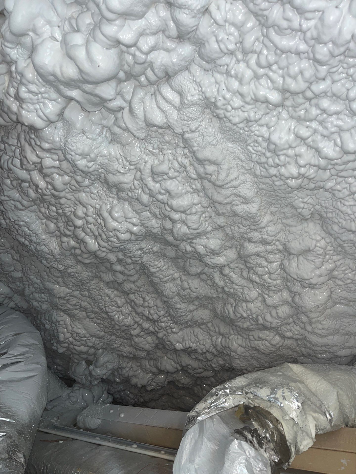 Attic Insulation using open cell spray foam by NYS Foam & Energy