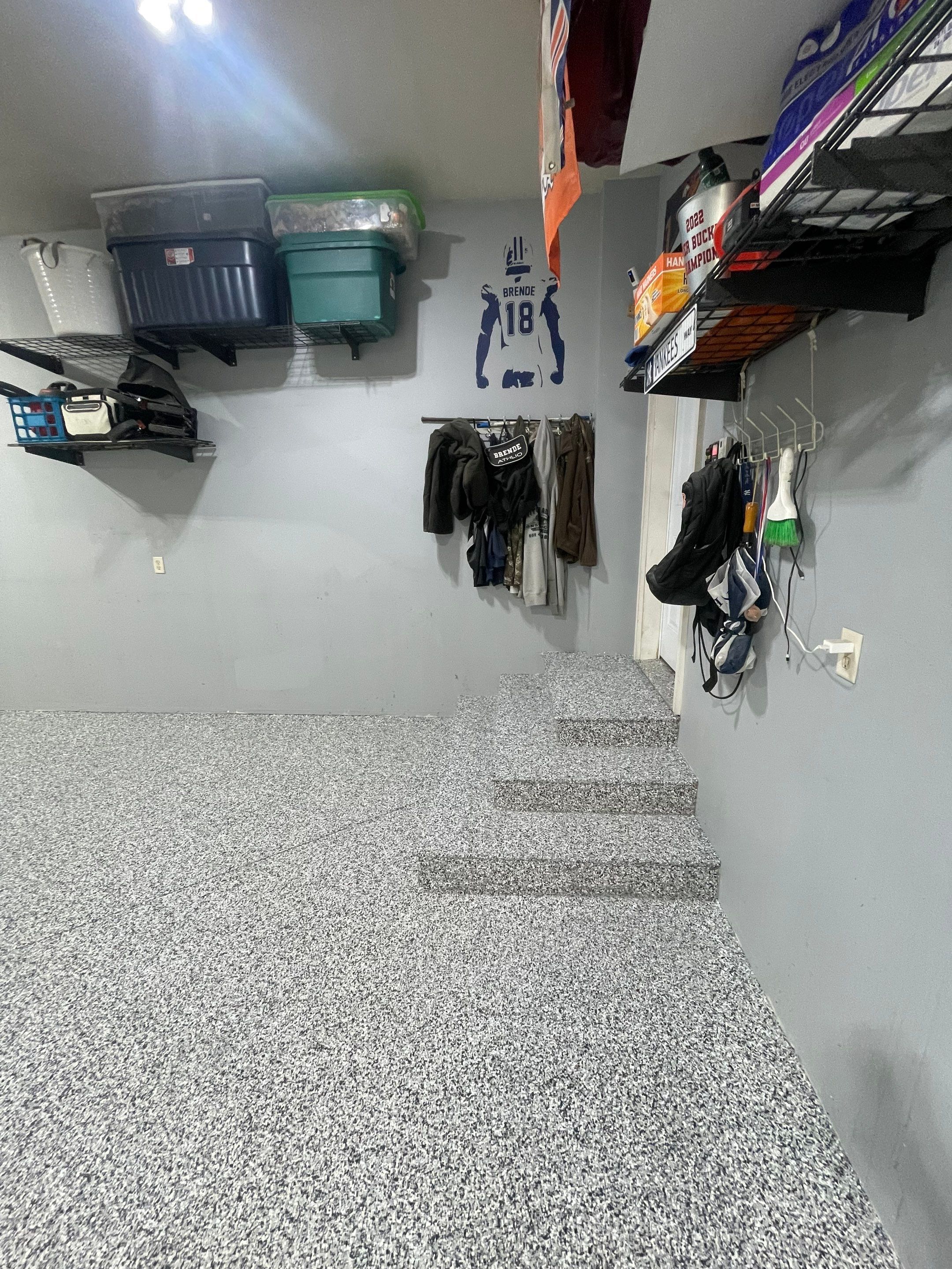 Full Garage Floor Epoxy Coating Installation in Dell Rapids by Select Painting, Coatings & Garage Cabinets