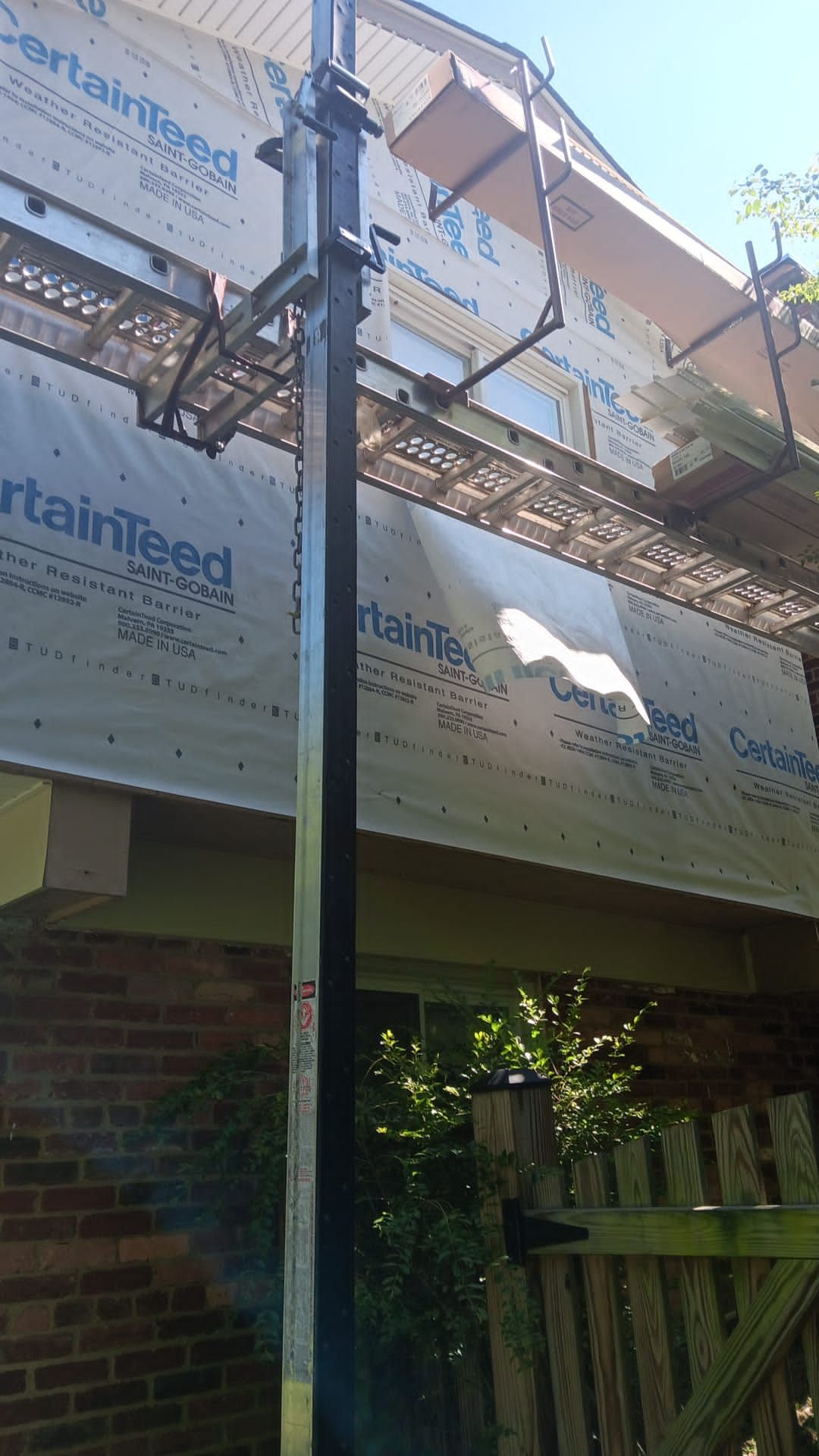 Fairfax: Residential Siding Replacement with CertainTeed 8" Board and Batten Siding in Desert Tan by RM Banning, Inc.