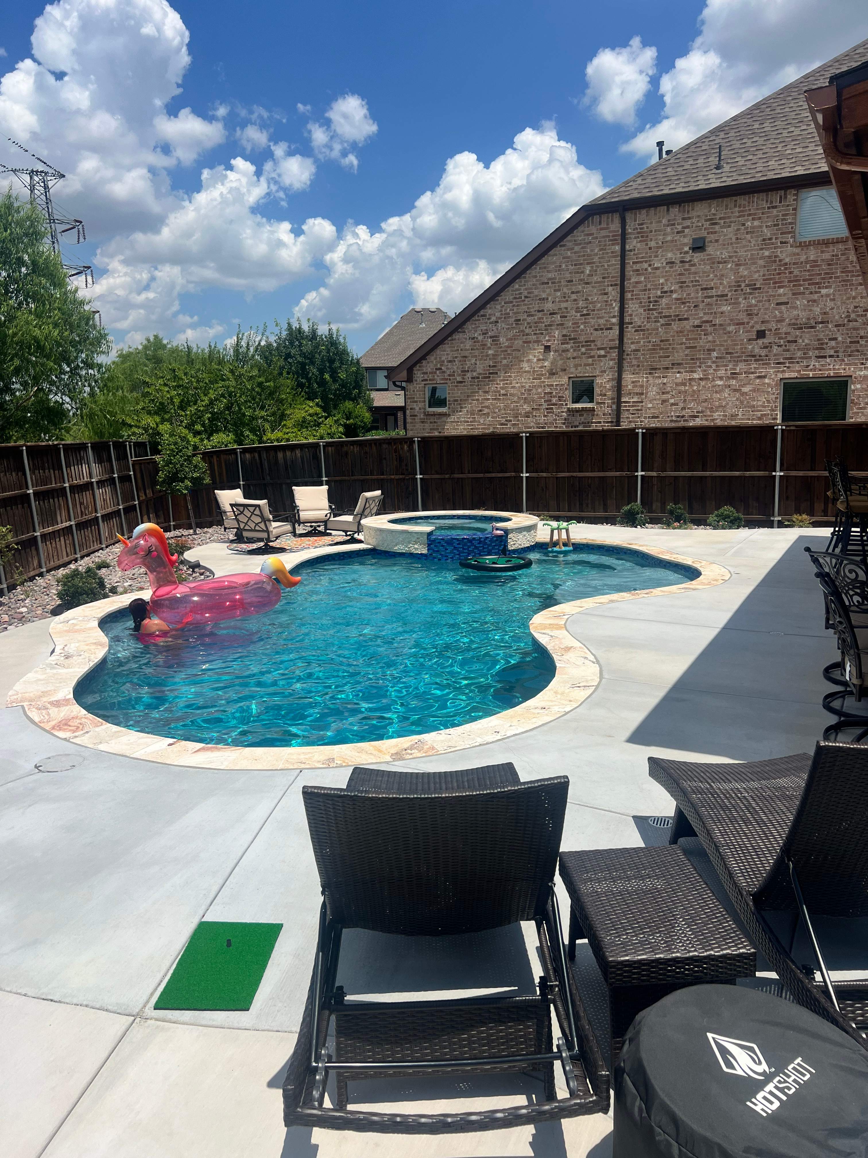 Freeform Pool and Spa with Pergola and Outdoor Kitchen by Pinnacle Pools and Spas - DFW