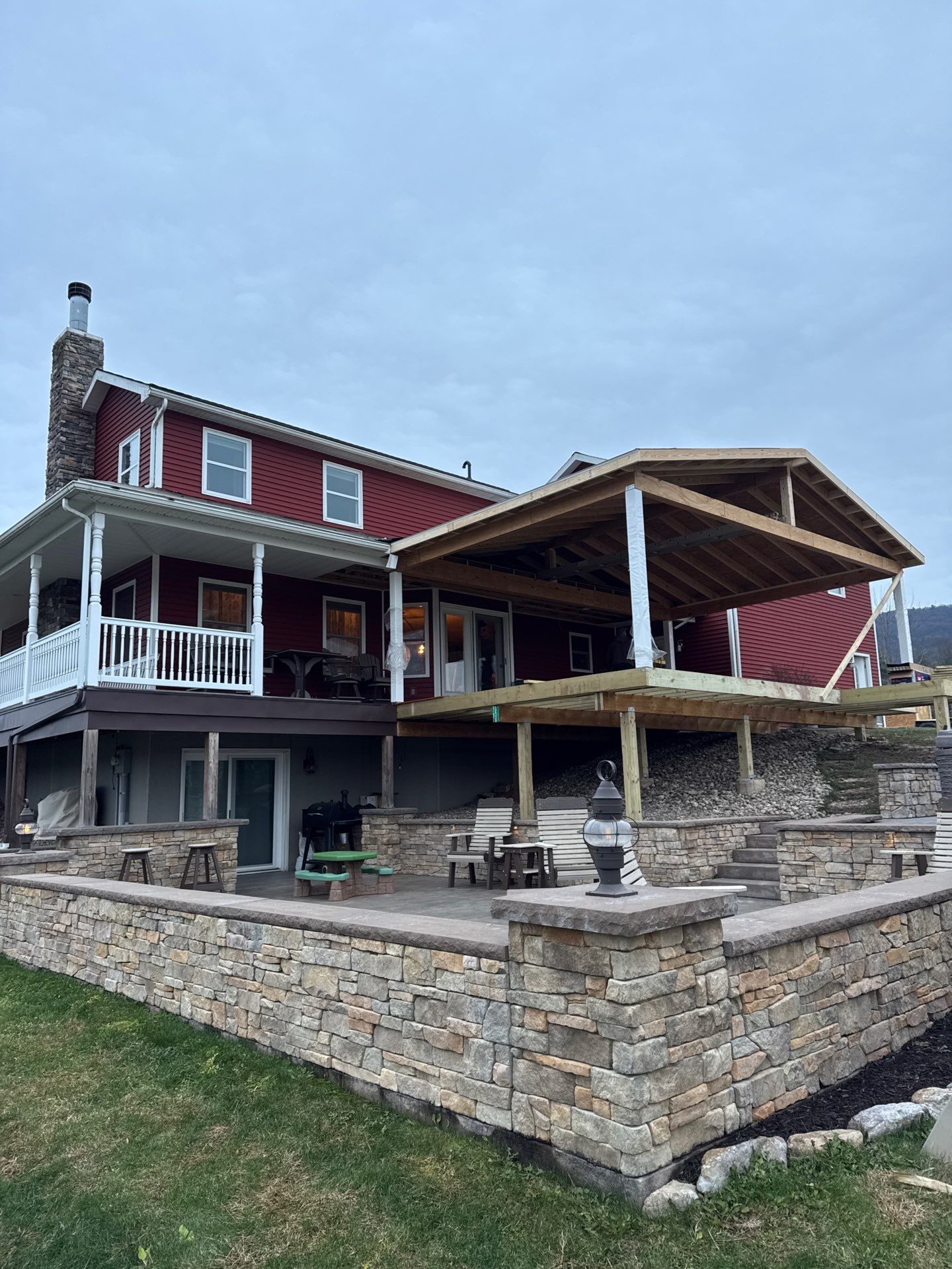 Covered Deck Addition With Custom Gable Roof in Tower City by Esh Builders
