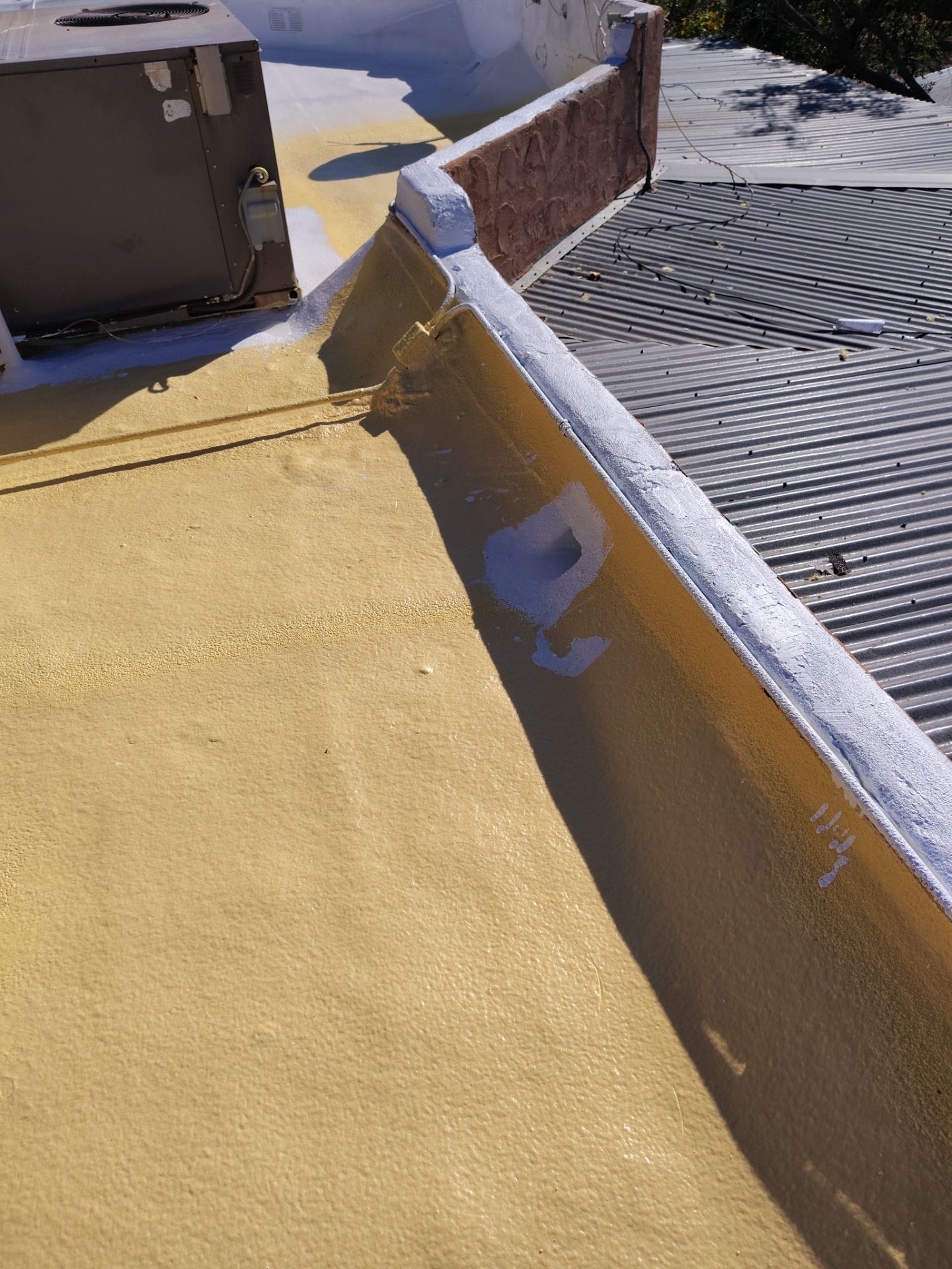 Residential roof application by SPF Services 