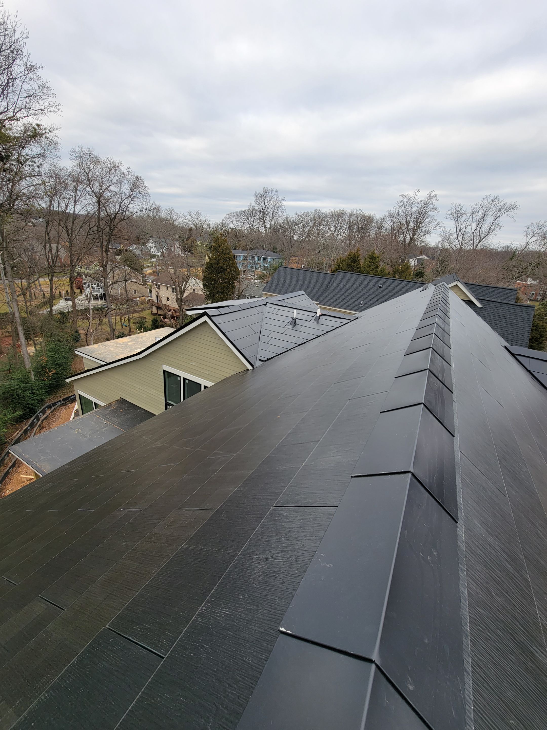 New Construction Tesla Solar Roof by American Home Contractors