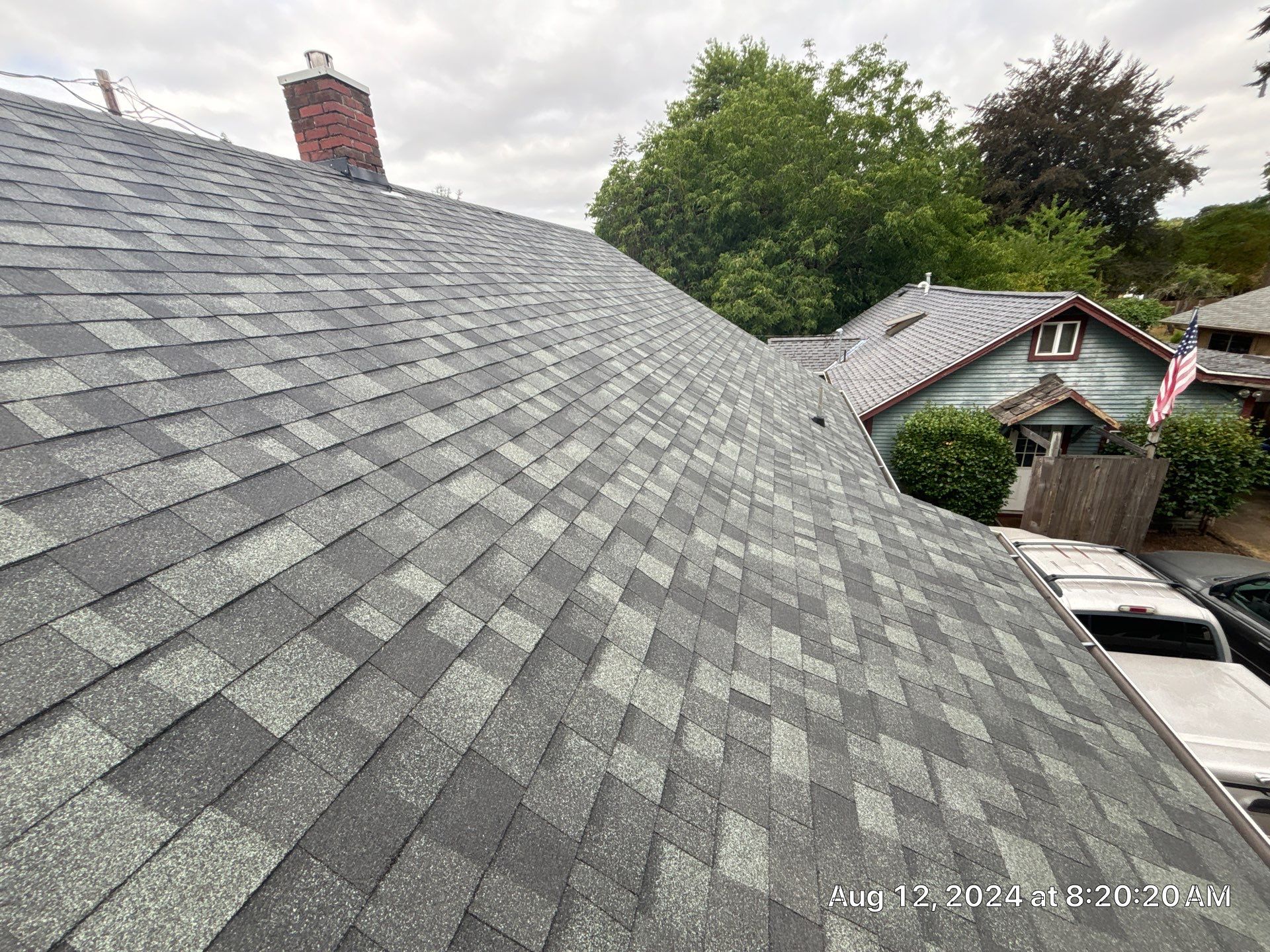 Residential Reroof using Owens Corning Duration Shingles in the color Estate Gray. by BEST Roofing & Waterproofing