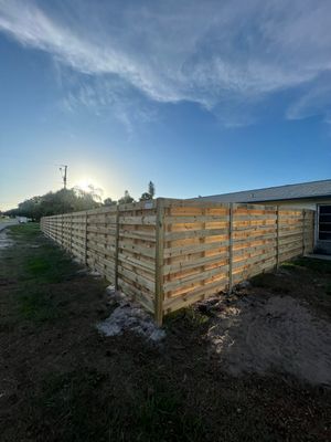Wood Fence Installation using Horizontal Shadowbox Wood Privacy Fence
