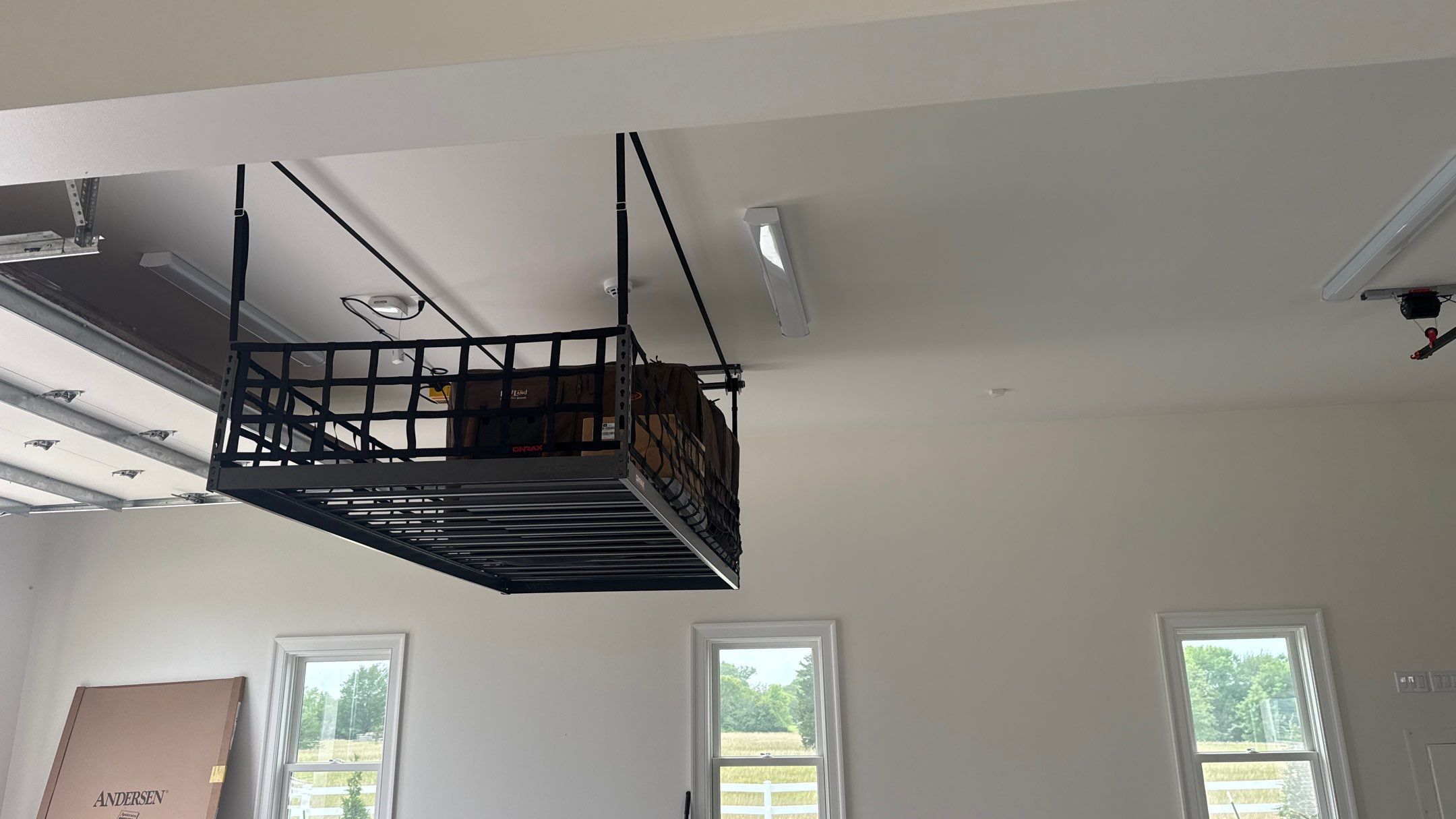 Mark Added Storage Plus A Motorized Lift by Banner Garage