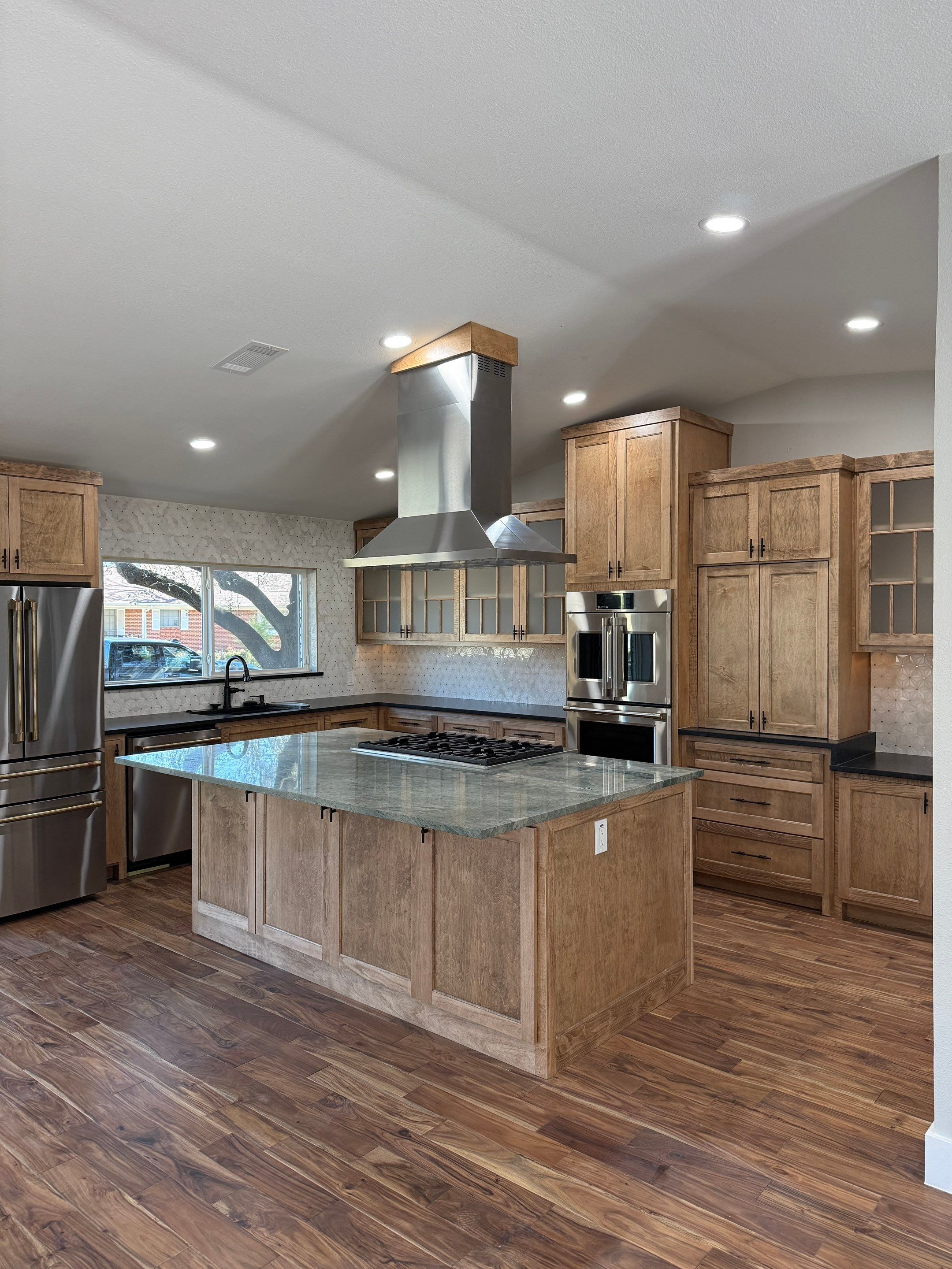 Custom Kitchen Remodel & Load Bearing Wall Removal: Dallas, TX by C3 Custom Builds