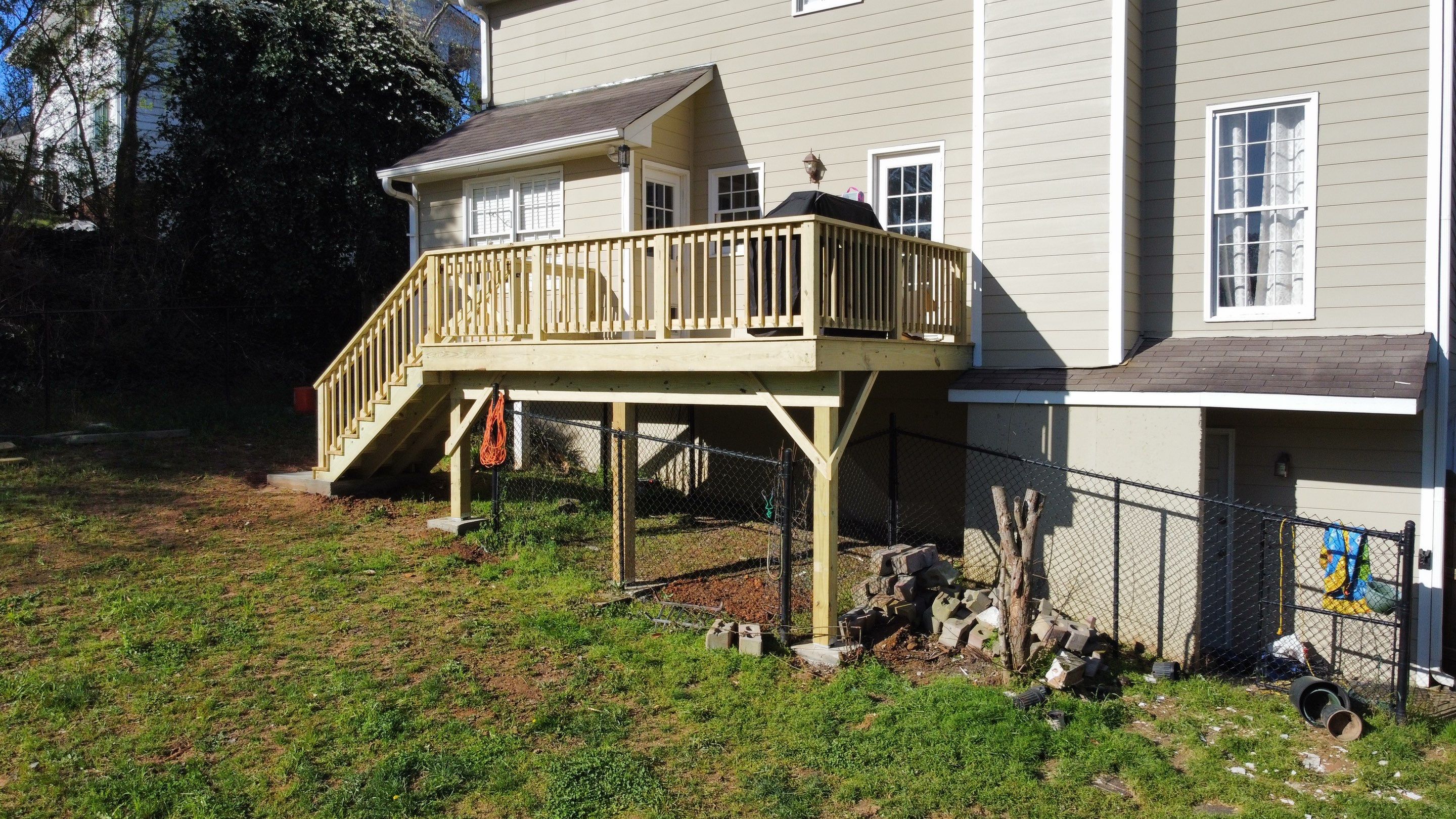 Elevated Pressure-Treated Wood Deck Replacement in Marietta by Swift Home Renovations