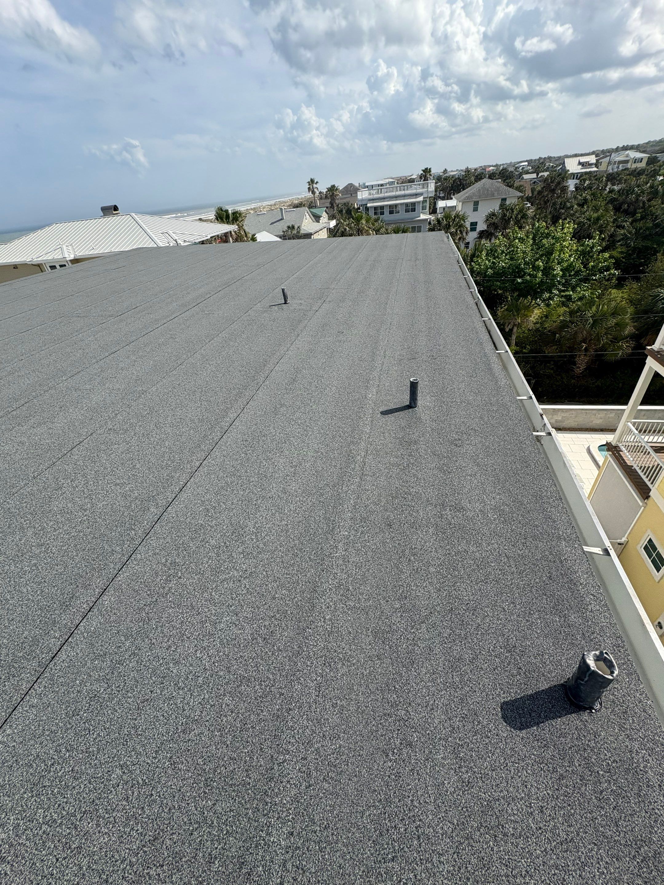 Flat Reroof Replacement St Augustine FL by Pinnacle Roofing Group