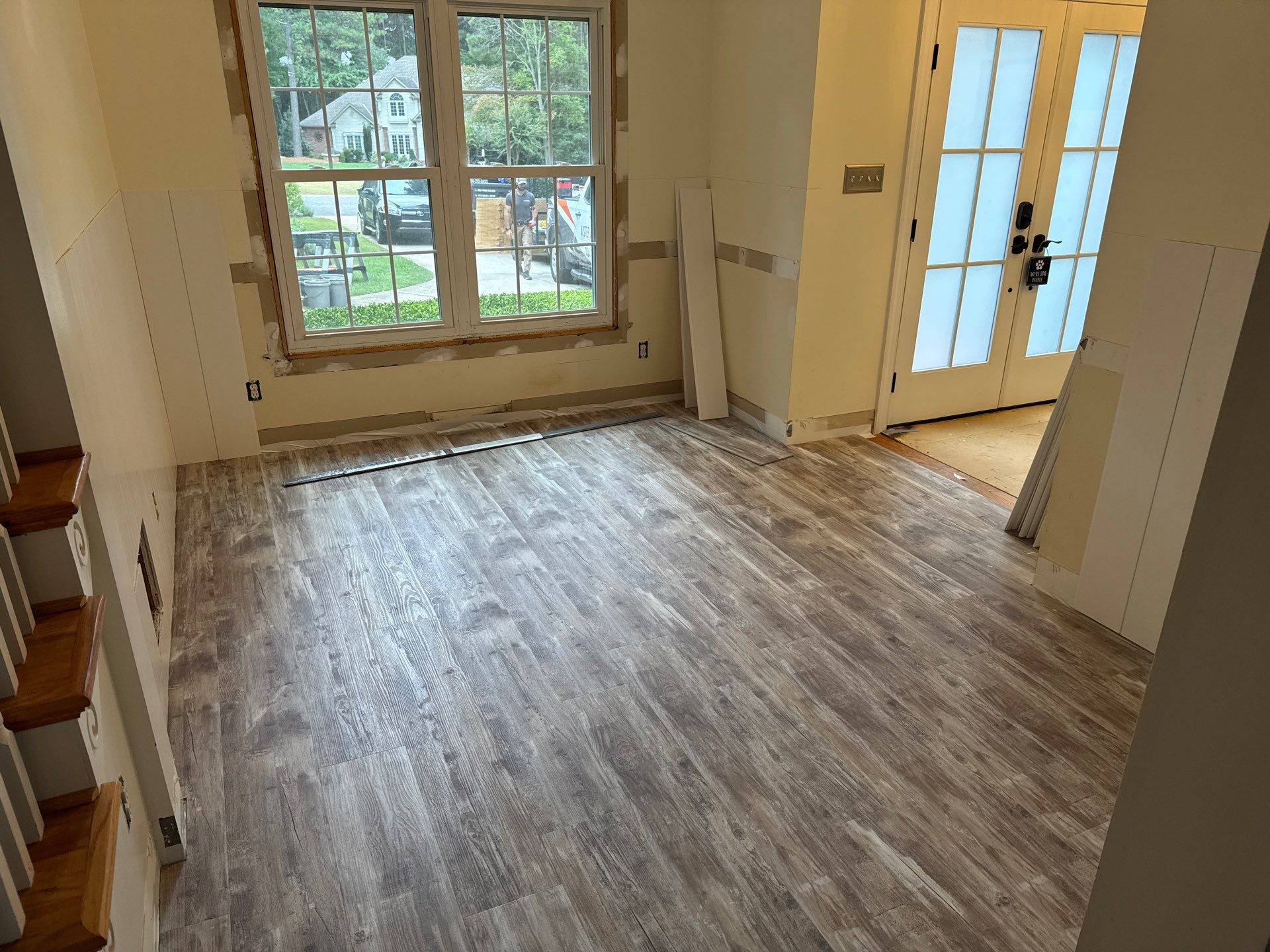 Front Room Transformed into a Waterproof Pet Room by A Step Above Handy LLC 
