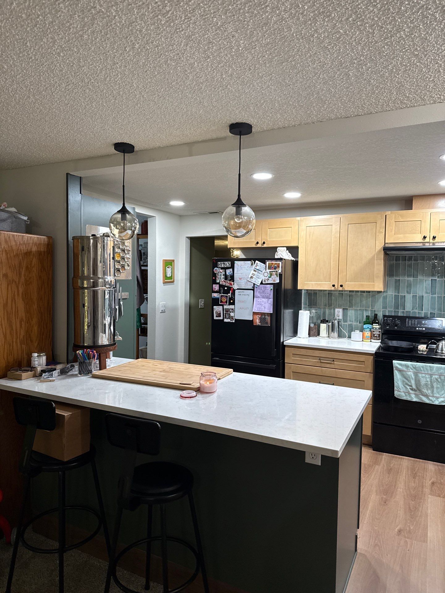Vancouver Kitchen Renovation Featuring Tile Backsplash and Farmhouse Sink by American Made Construction 