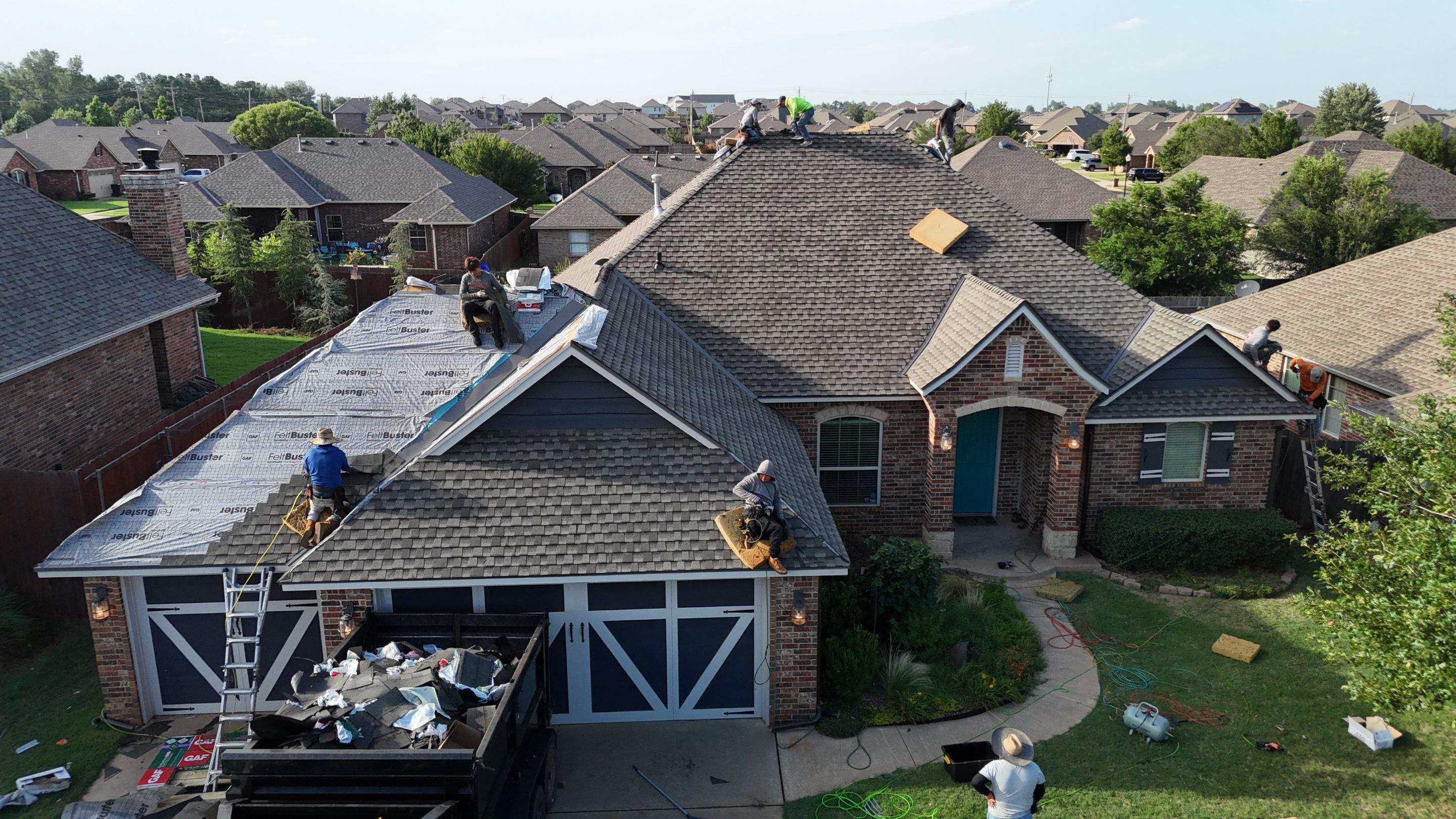 GAF Architectural Shingle Roof Replacement and Decking Repair in Mustang by 5Coat Roofing & Construction