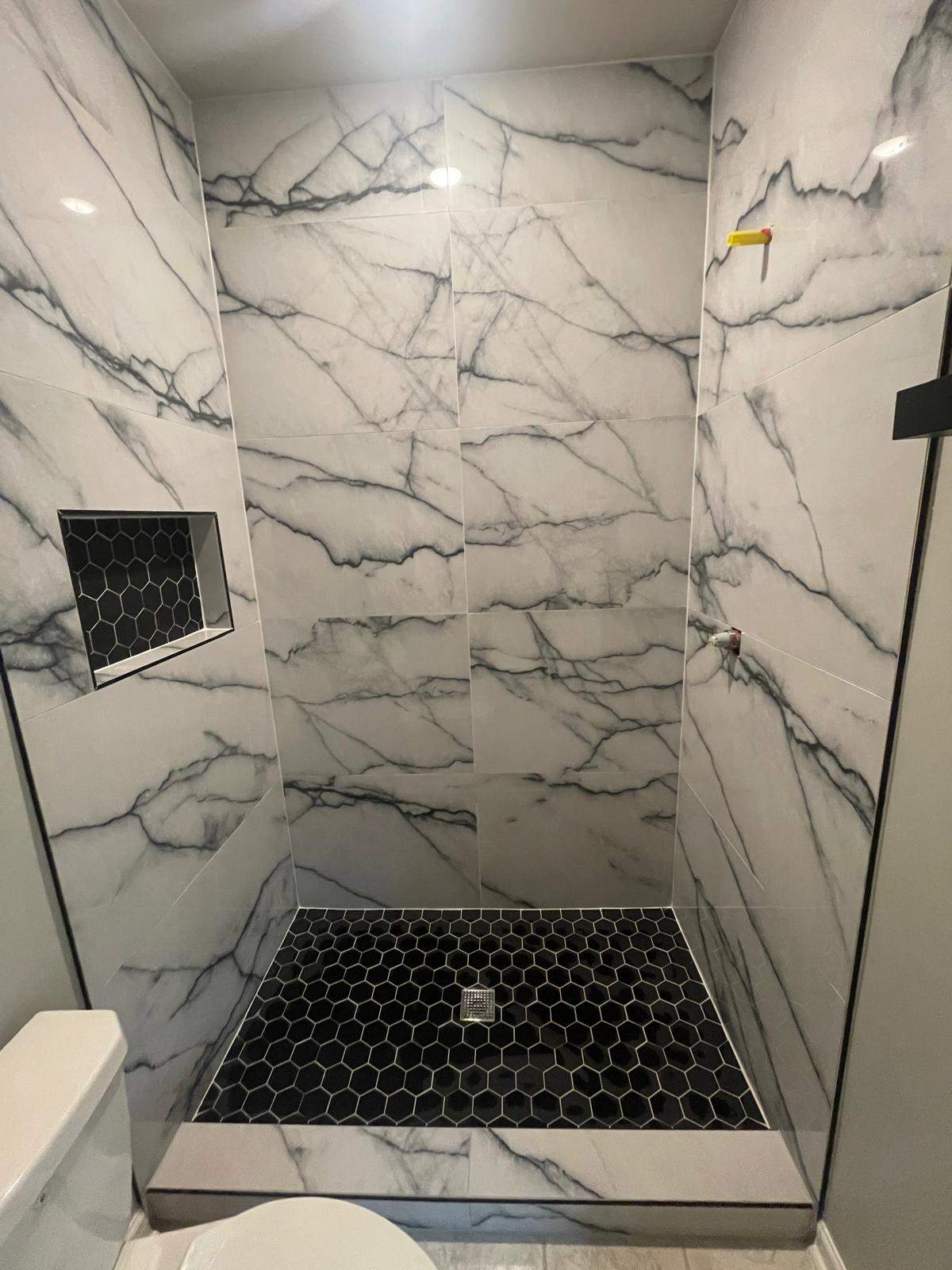 Tub to walk-in shower conversion by Prudencio