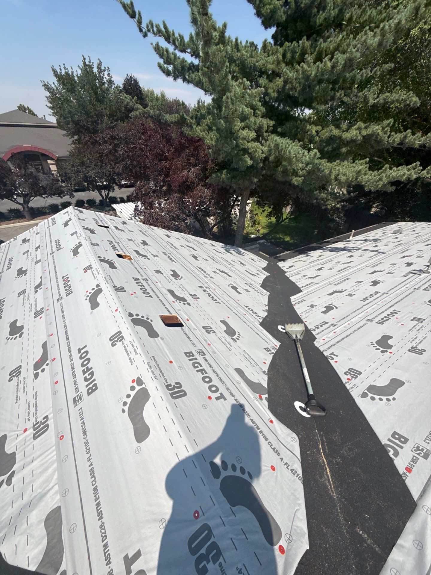 Boise Commercial Roof Replacement with Brown Architectural Shingles by Olive Roofing