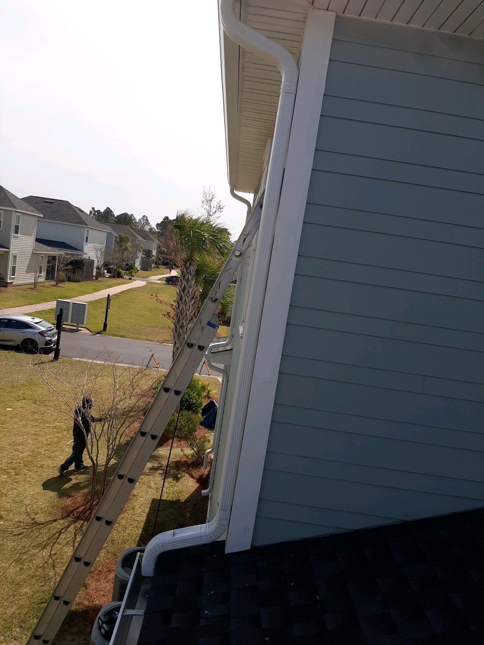 Gutter Installation Using White K-Style 6 Inch Seamless Gutters by Gutter Professors