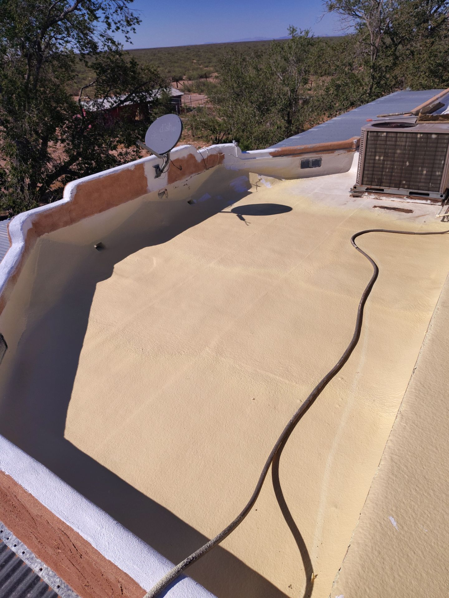 Residential roof application by SPF Services 