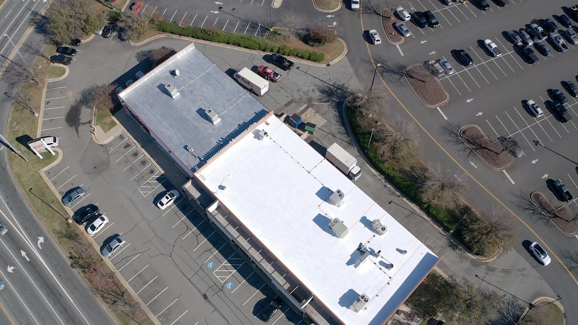 Commercial Coating using Poly Urerthane and Silicone Coating by Just In Time Roofing and Restoration