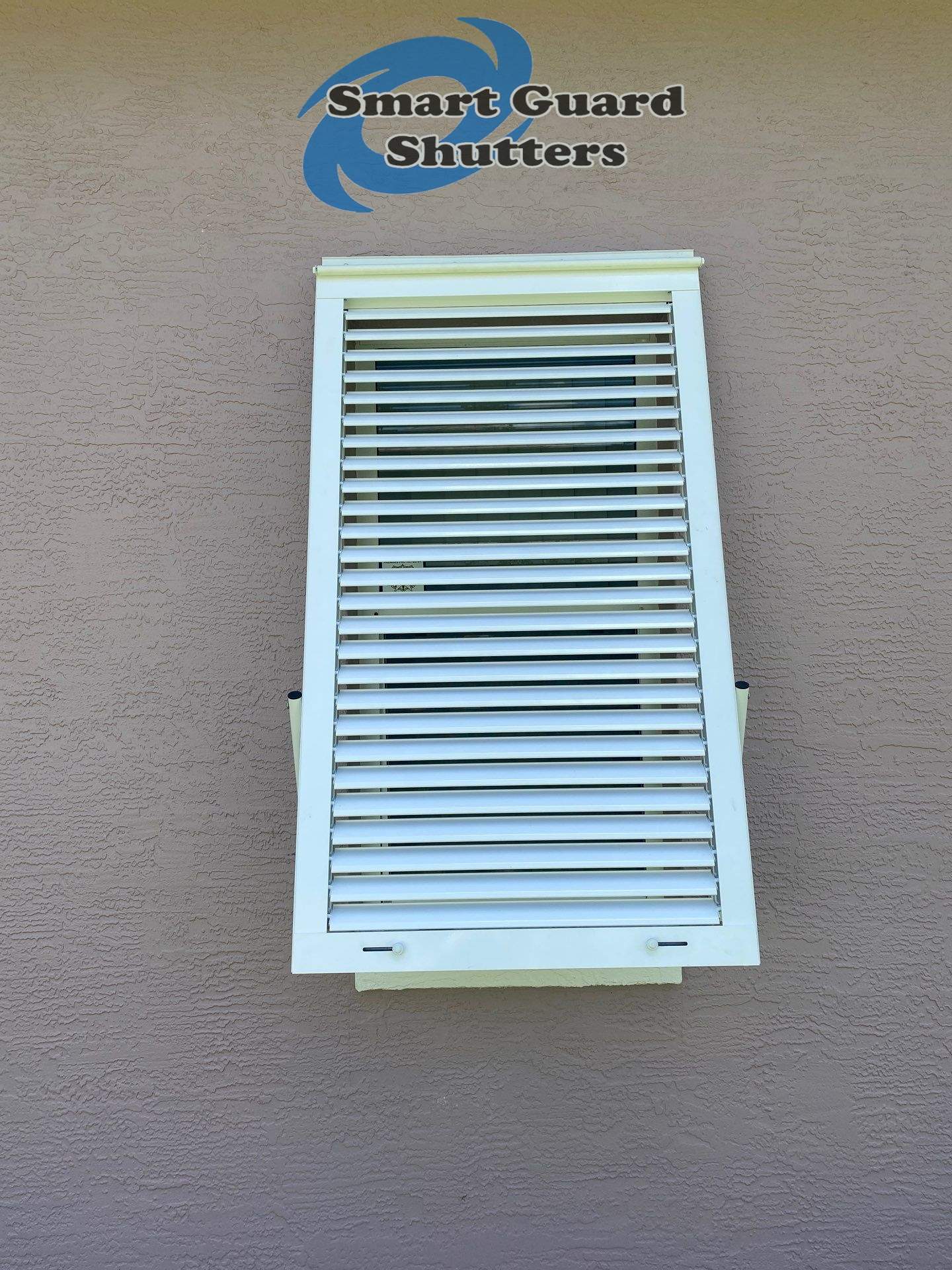 Impact Bahama Shutters in Signal White by Smart Guard Shutters