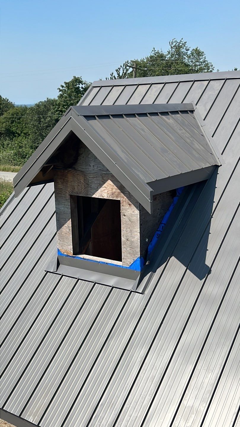 Agricultural Roofing Installation using 12" Prolok metal  by Top Notch Roofing Inc