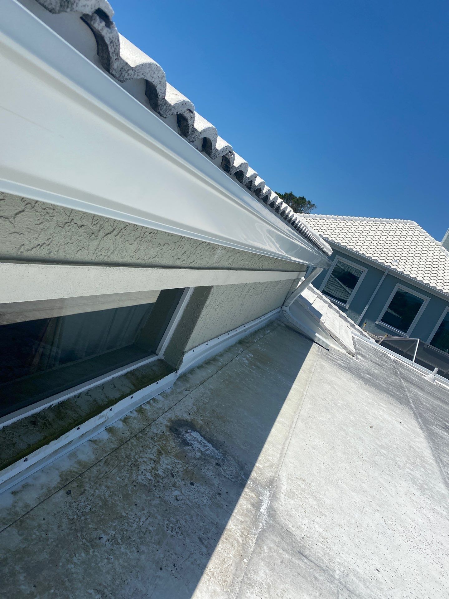 Splash Guard Gutters for Coastal Homes in Longboat Key FL by Gutter Professors