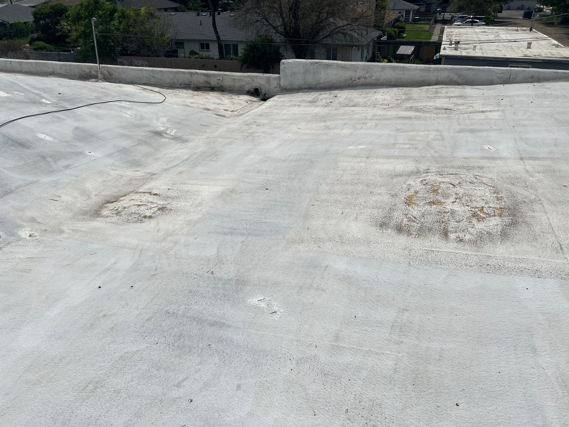 Foam Refurbish using Conklin Benchmark/PUMA XL coatings and spray foam by Straight Edge Roofing Inc