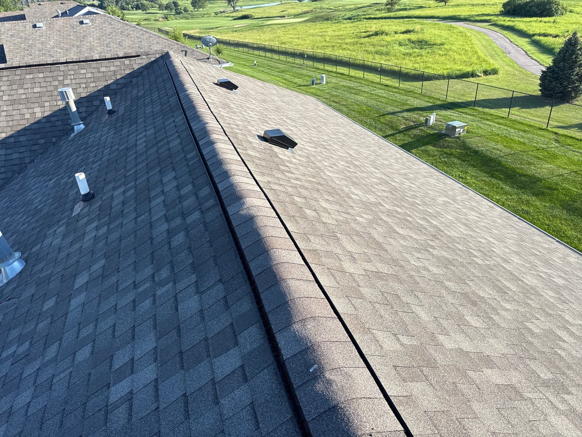Residential Architectural Shingle Roof Replacement and Gutter Upgrade in Lincoln by Star Home
