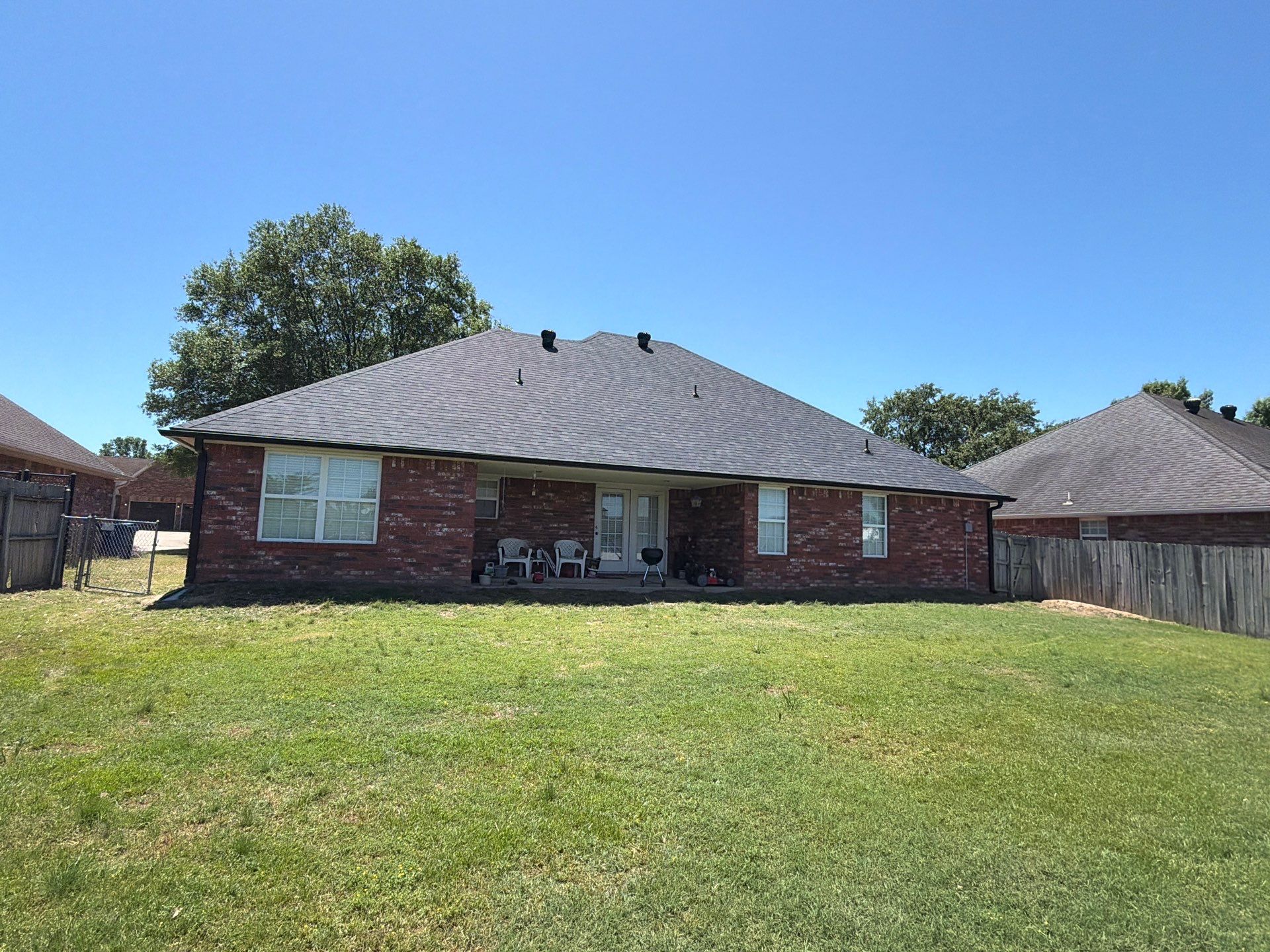 Black roof & gutters!! by In & Out Construction & Remodeling, LLC