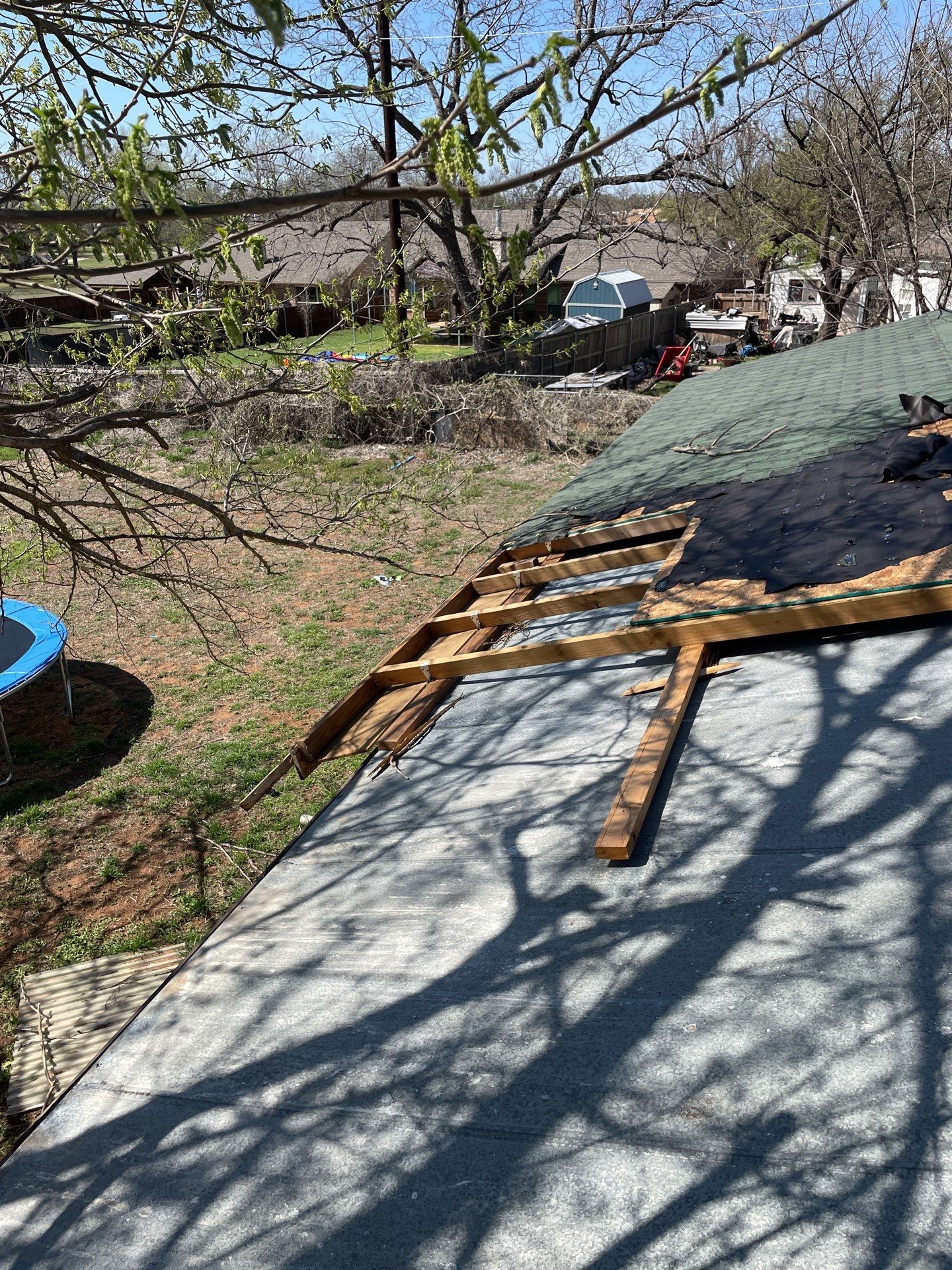 Roof Damage using ATLAS Pinnacle Pristine Shingles by Harvey Roofing & Construction