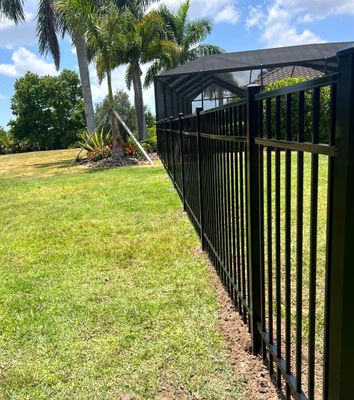 Aluminum Fence Installation using Black 3 Rail Aluminum Fence