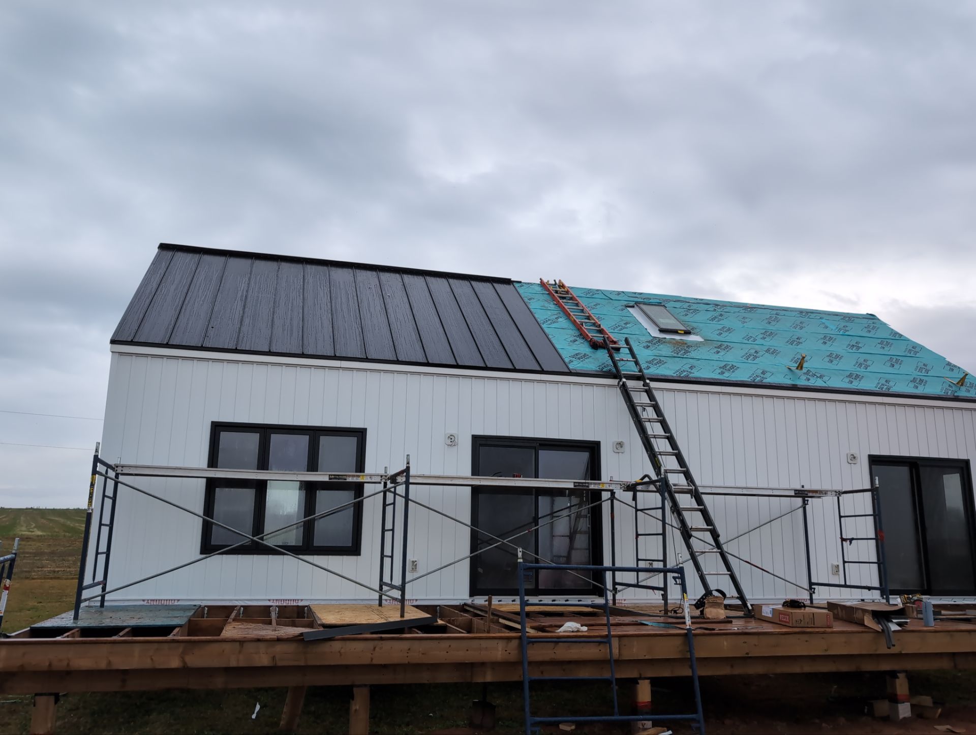 Residential Roofing Installation using Standing Seam Steel by Artisan Roofing & Home Improvements Inc.