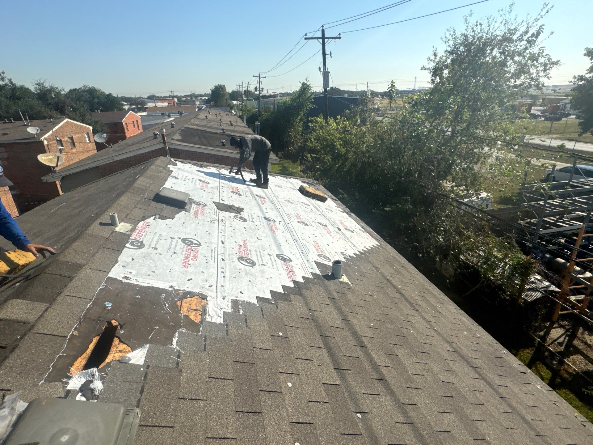 Apartment Roof Replacement by Associates Roofing Unlimited 
