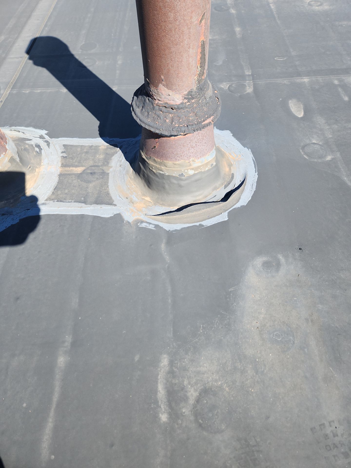 Commercial Roofing Repair using UniFlex Silicone Roof Coating on KinderCare Learning Center by 3 Daughters Construction 