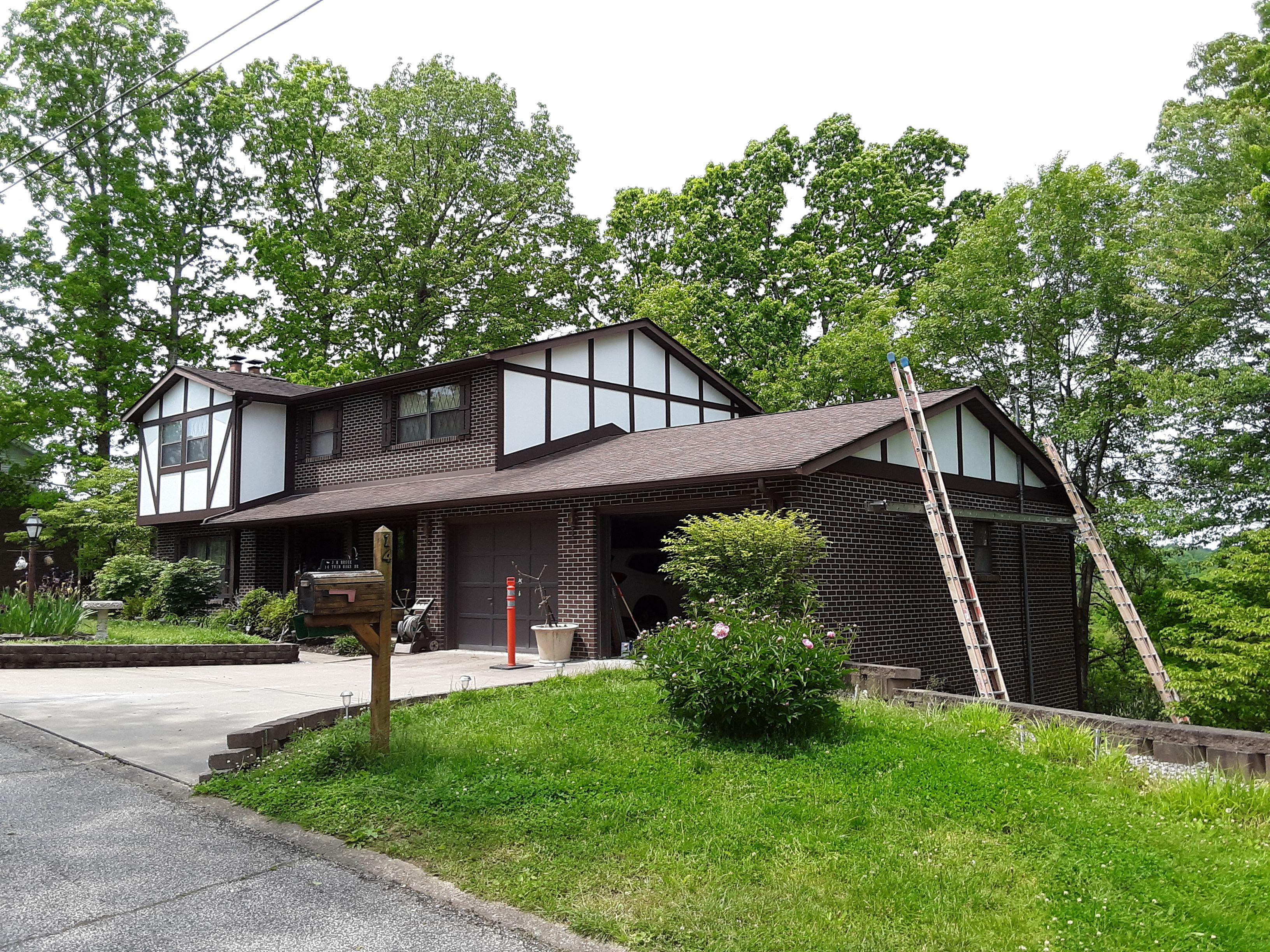 Old to New Tudor Style Fiber Cement Update  by Secure Construction Company Inc