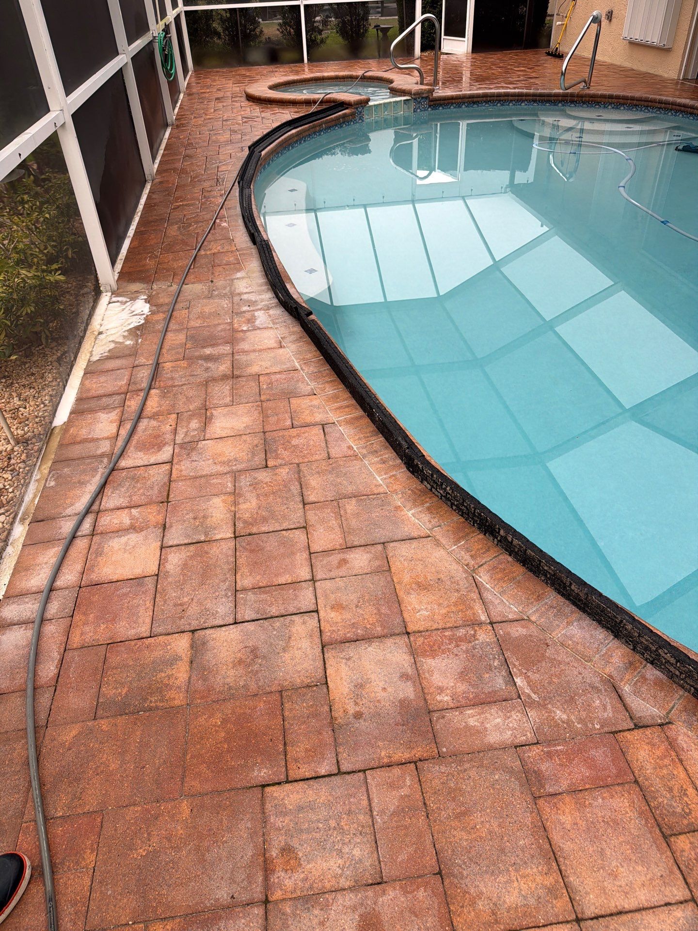 Paver Sealing and Striping for Sun City Center Pool Deck by Supreme Paver Experts