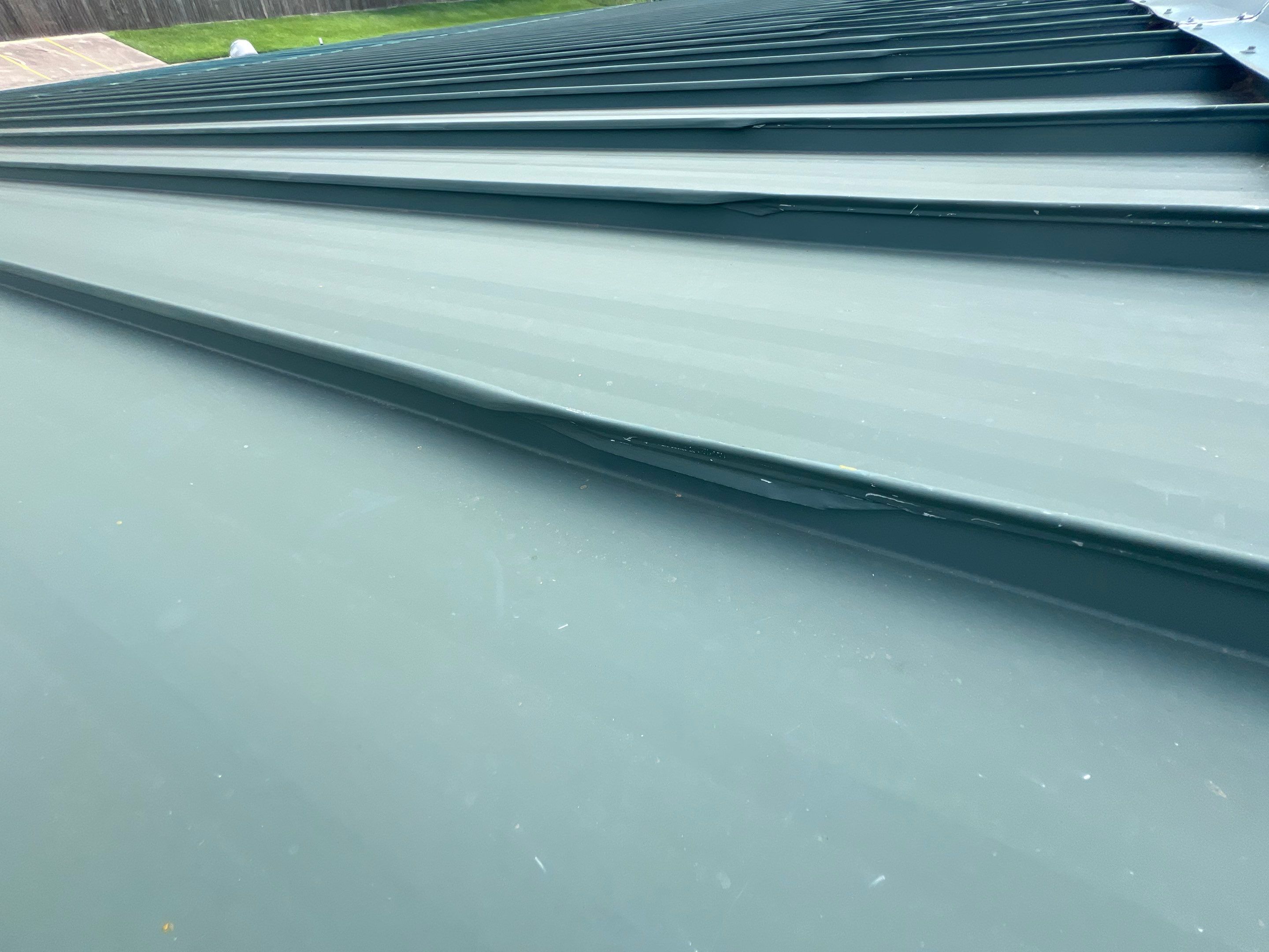 Hail Damage using Metal by Roof Repair Company