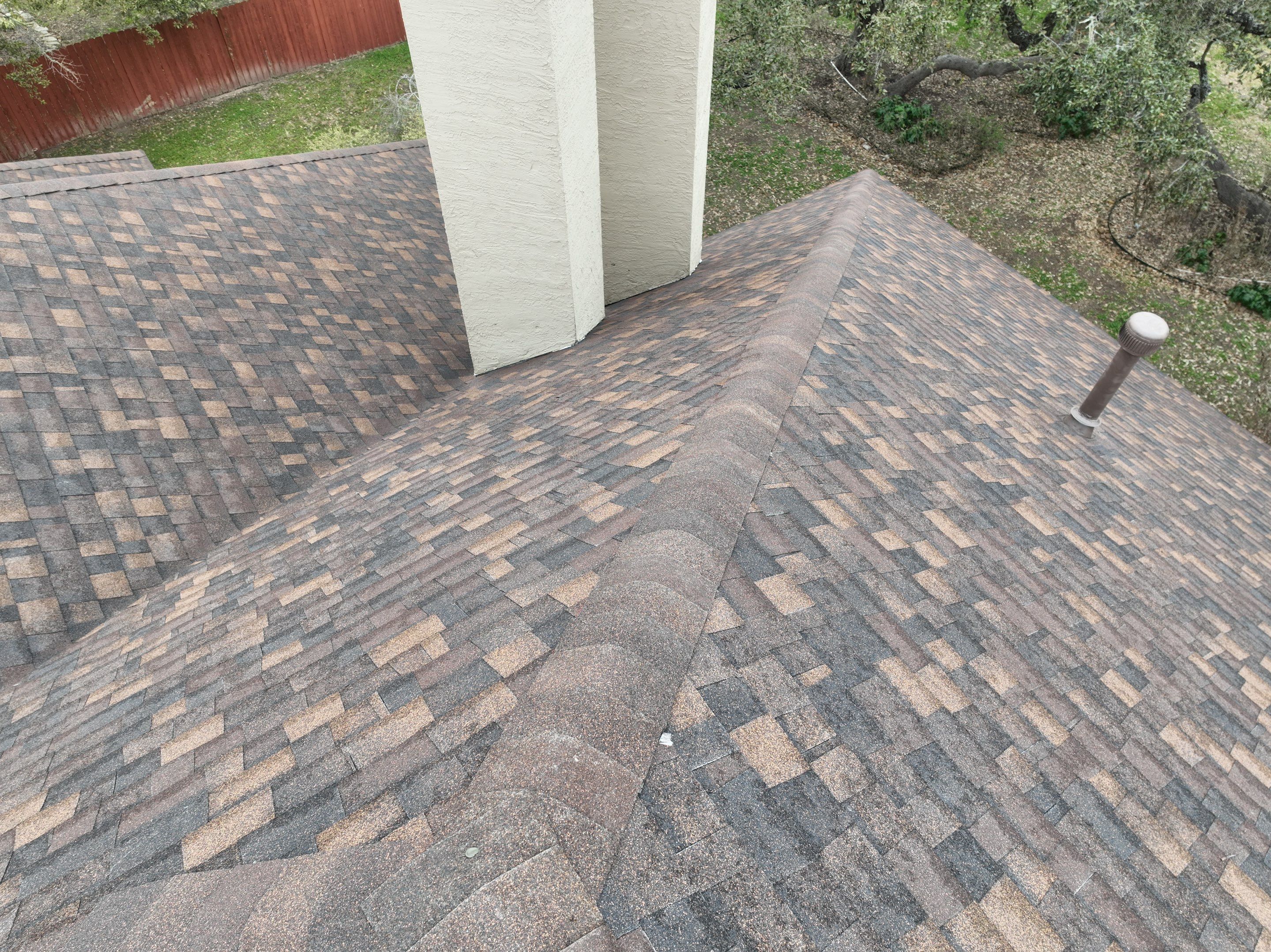 Residential Roof Replacement using 30 Year Laminate Shingles with High Profile Ridge by Premier Roofing and Contracting