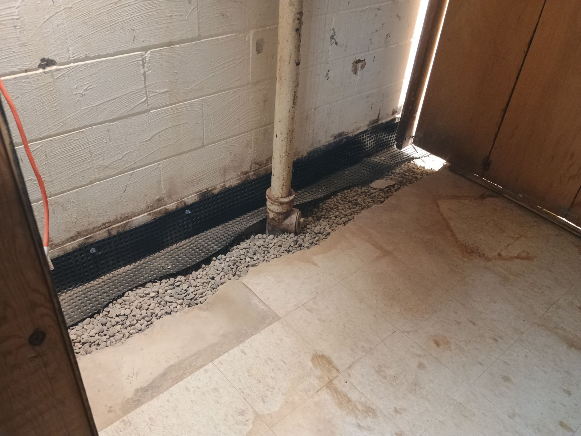 Interior Drain Tile Installation in Columbia Heights, MN by Waterproofing Northeast