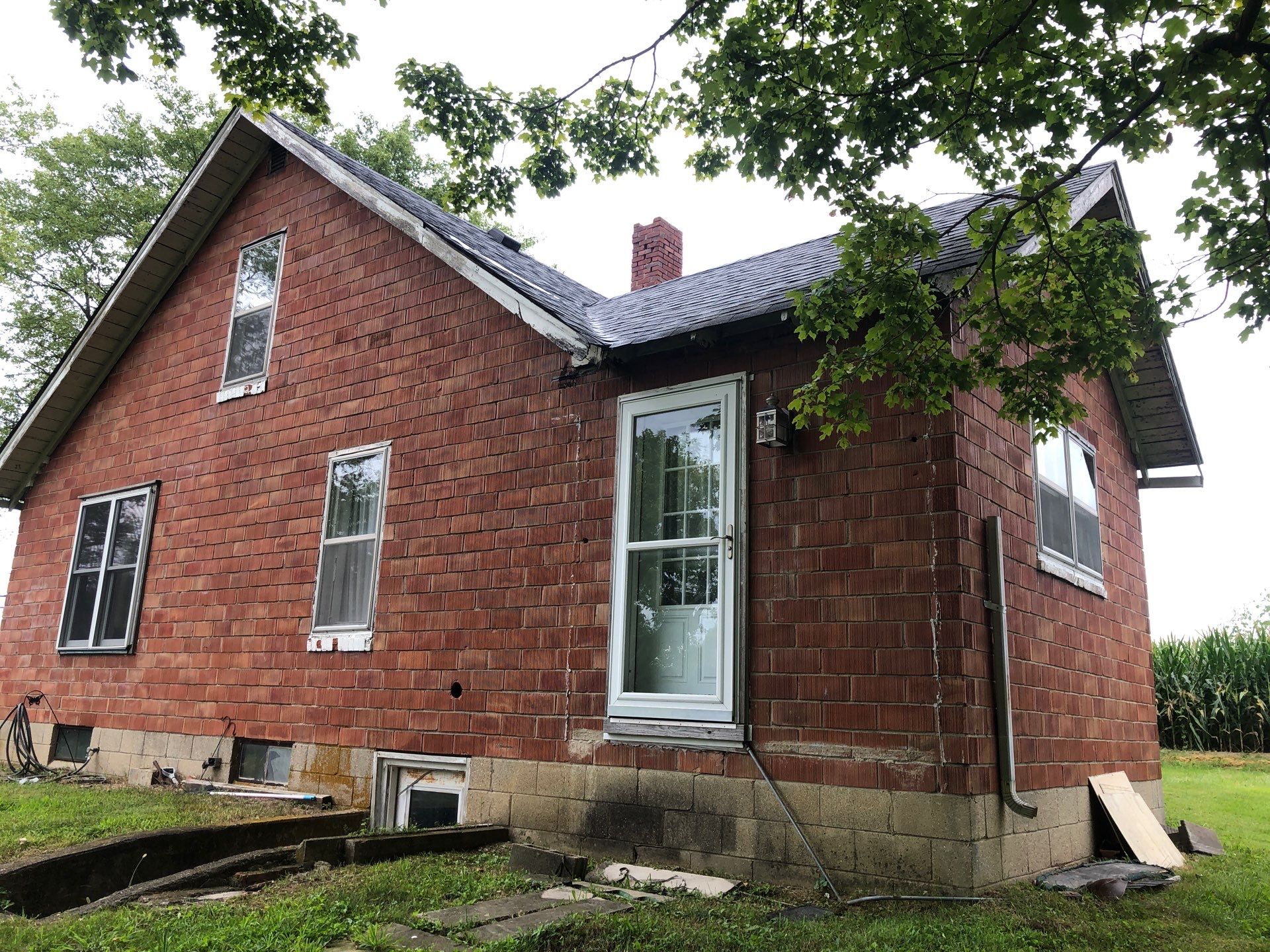 Old Farmhouse Restoration by 317 Roofing & Restorations