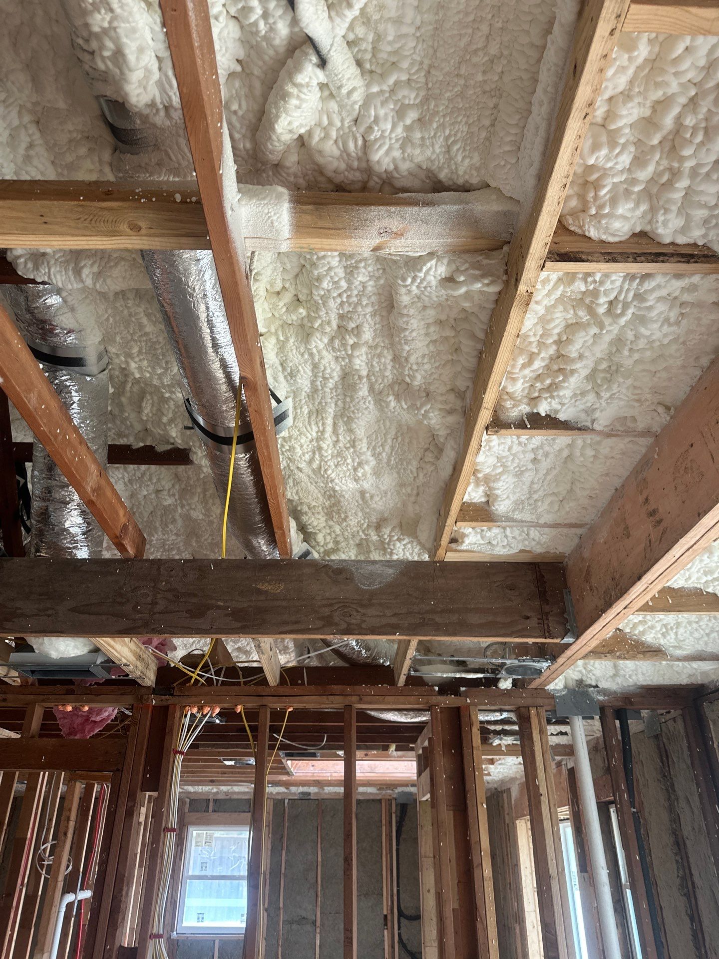 Open cell spray foam & rockwool job completed in Dallas TX by Apex Insulation Solutions