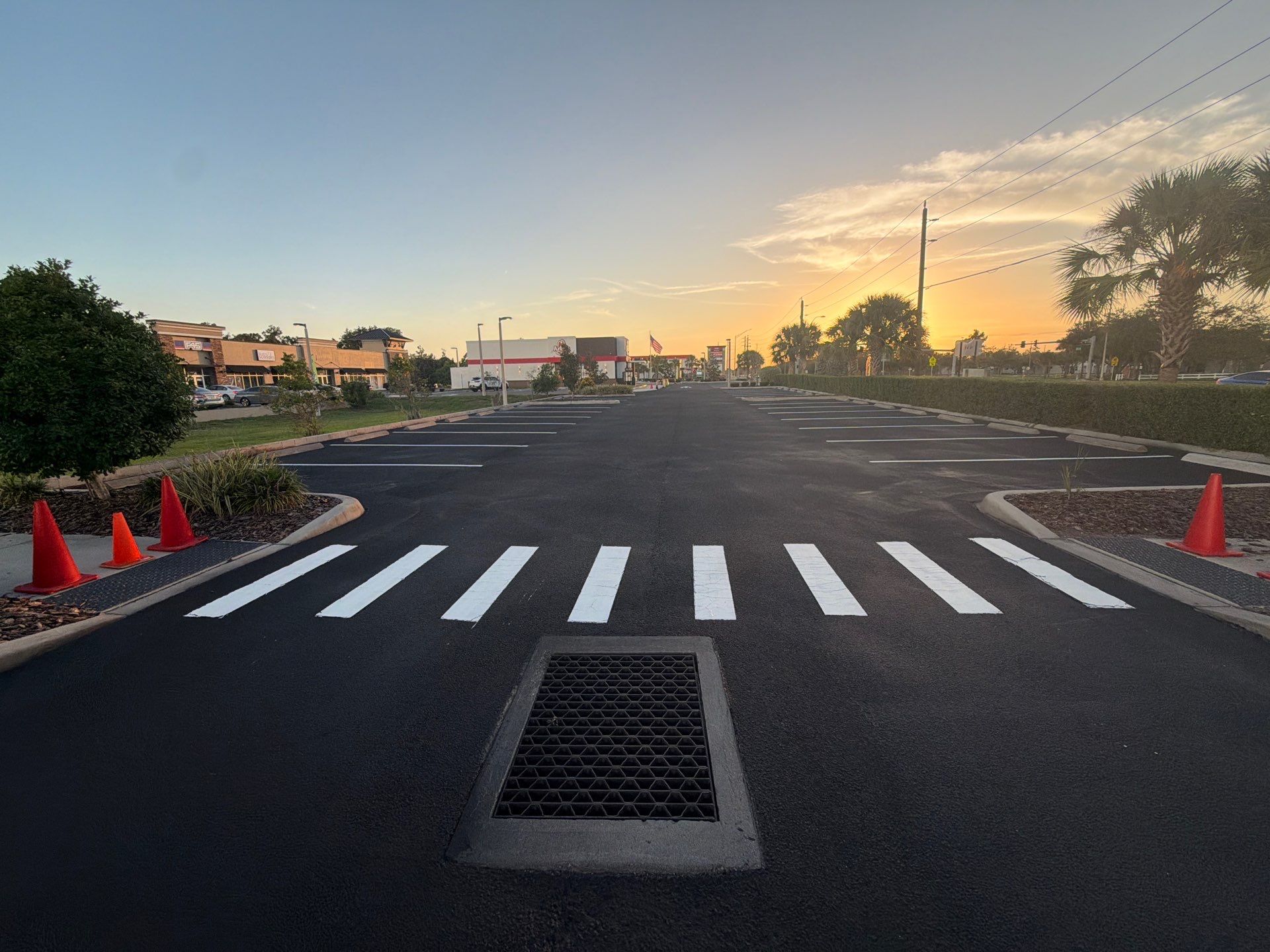 Commercial Asphalt Sealcoating and Line Striping at School House Plaza by Everline Coatings & Services - Southwest FL